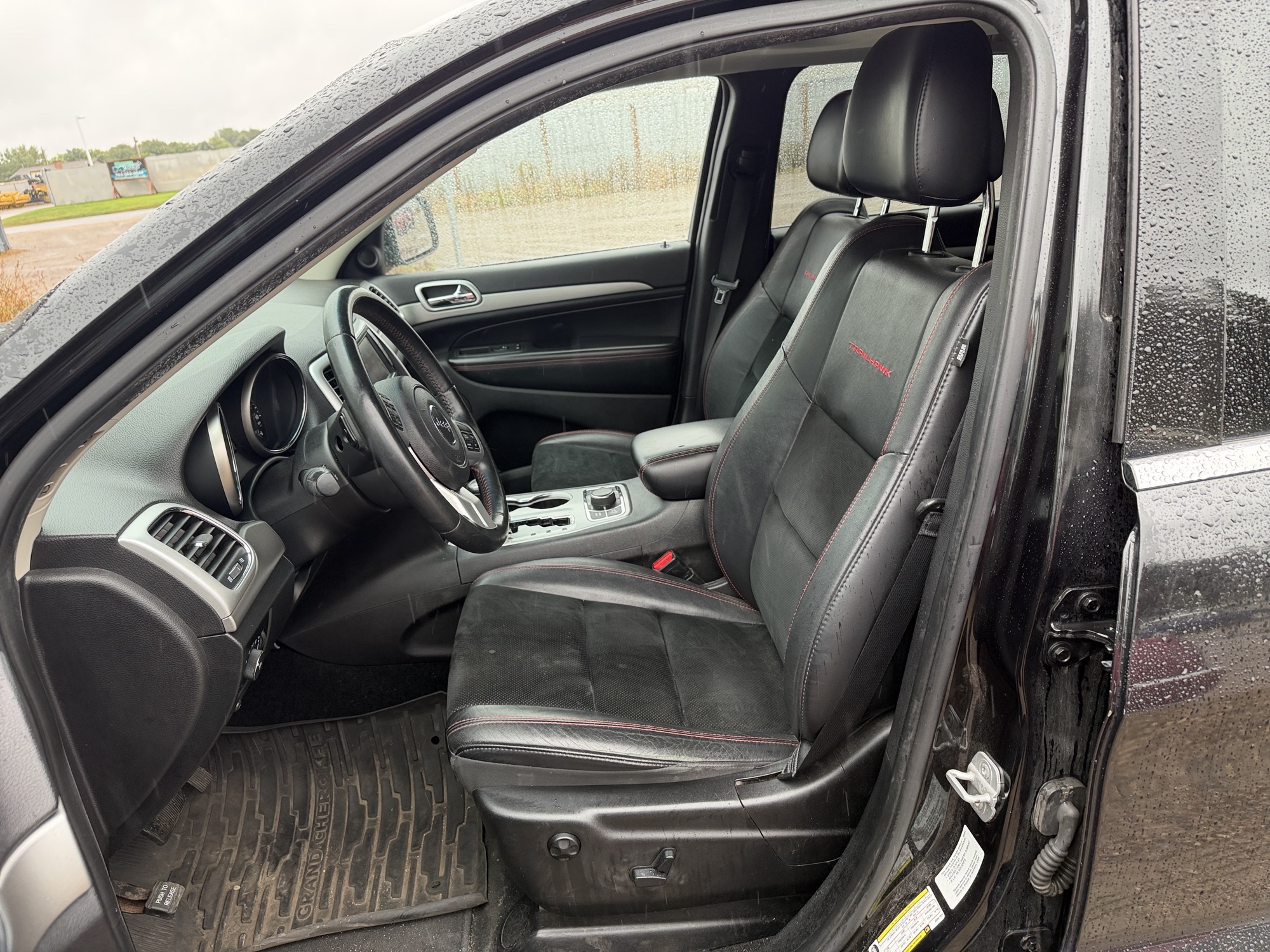 2013 jeep grand-cherokee laredo-4wd with 134157 miles for sale near elk-river, minnesota 106371_22_driver_seat.jpg
