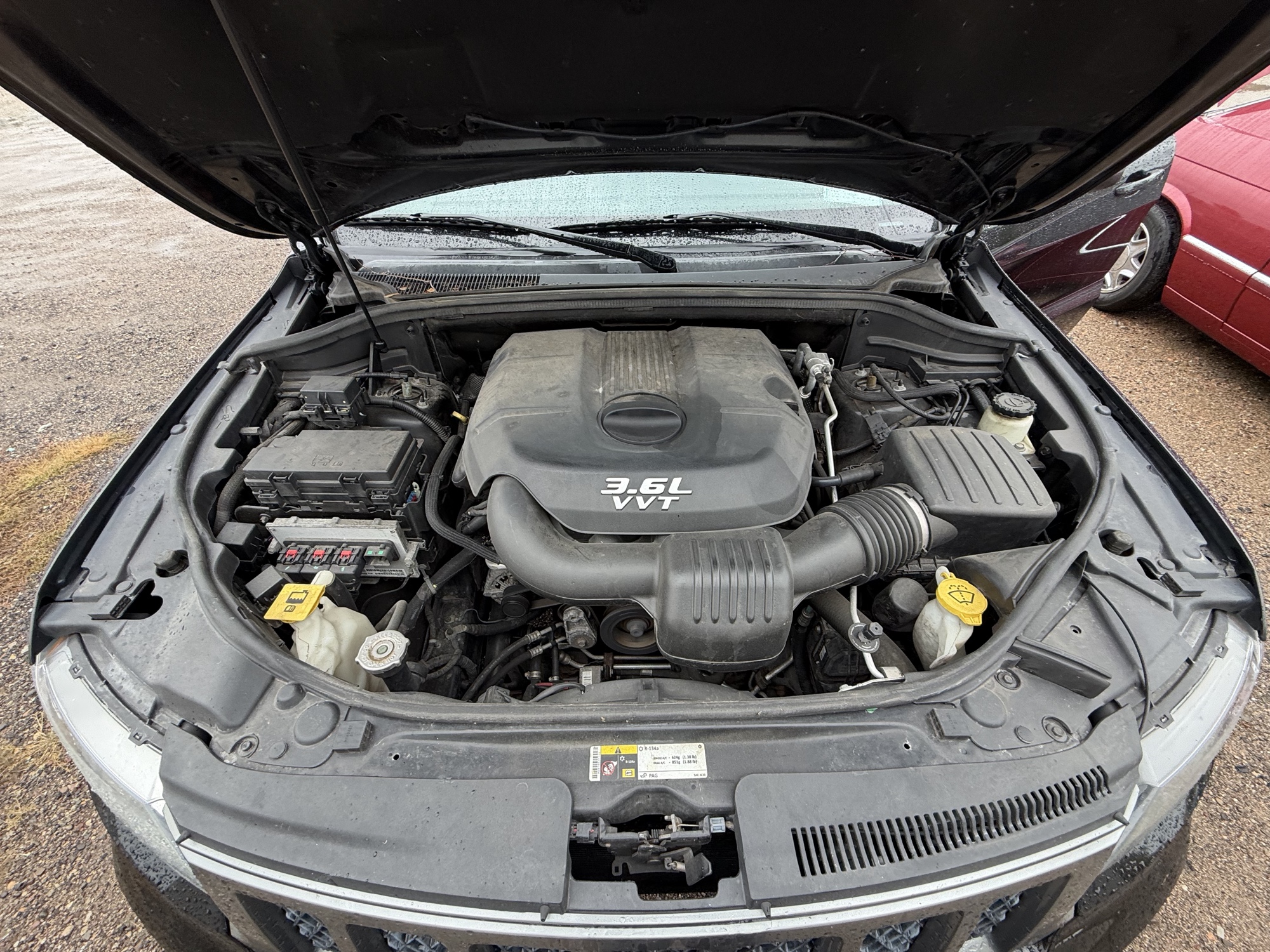 2013 jeep grand-cherokee laredo-4wd with 134157 miles for sale near elk-river, minnesota 106371_49_engine_bay.jpg