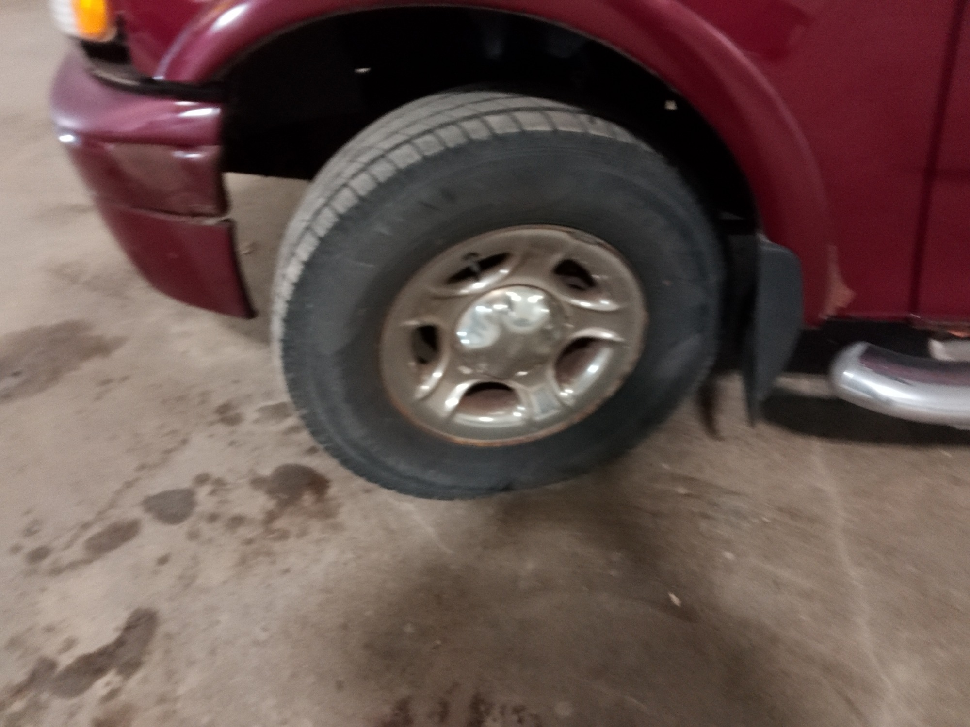 2003 ford f-150 xl-supercab-4wd with 200745 miles for sale near elk-river, minnesota 106377_12_drv_front_wheel.jpg