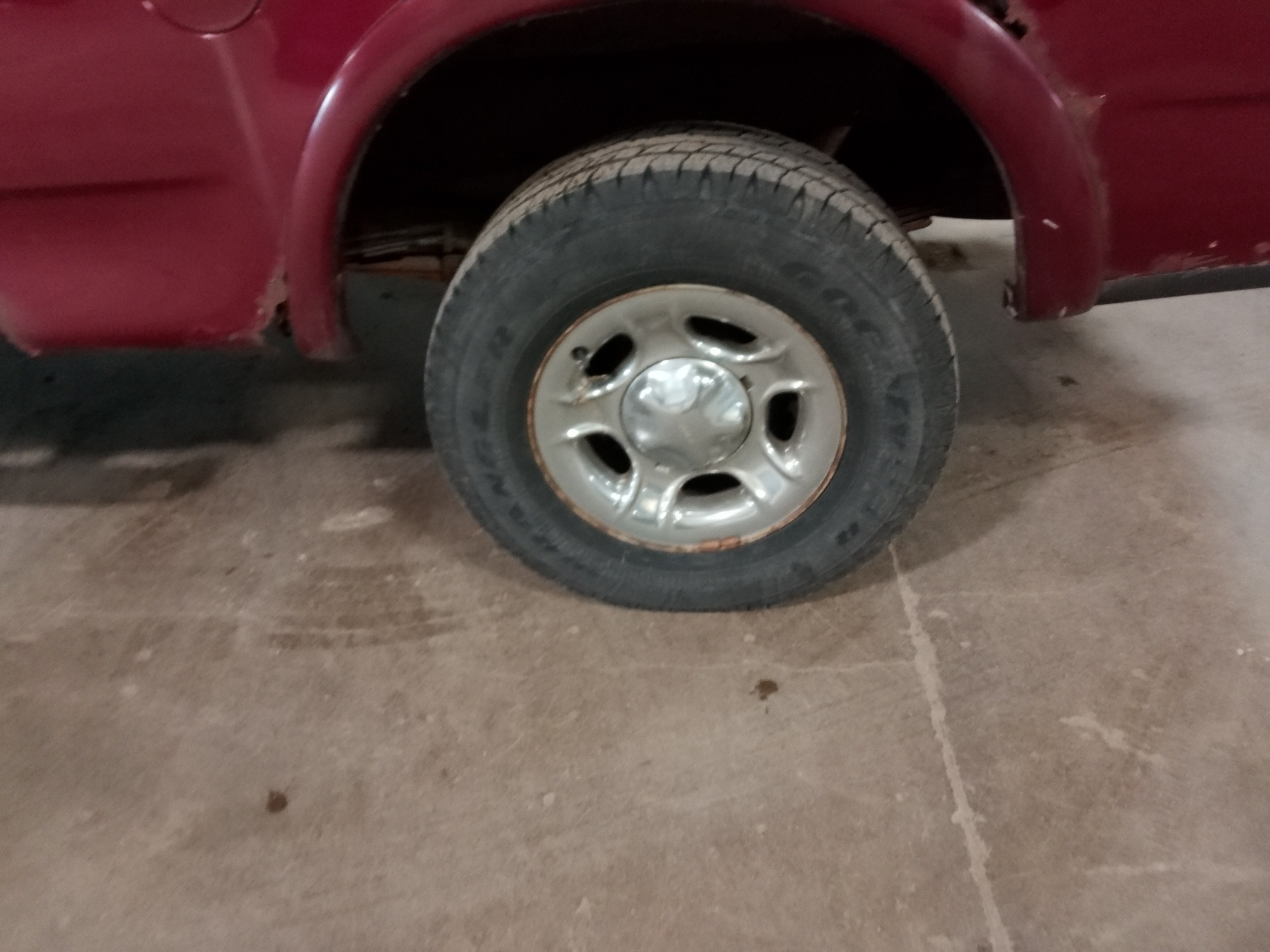 2003 ford f-150 xl-supercab-4wd with 200745 miles for sale near elk-river, minnesota 106377_13_rear_drv_wheel.jpg