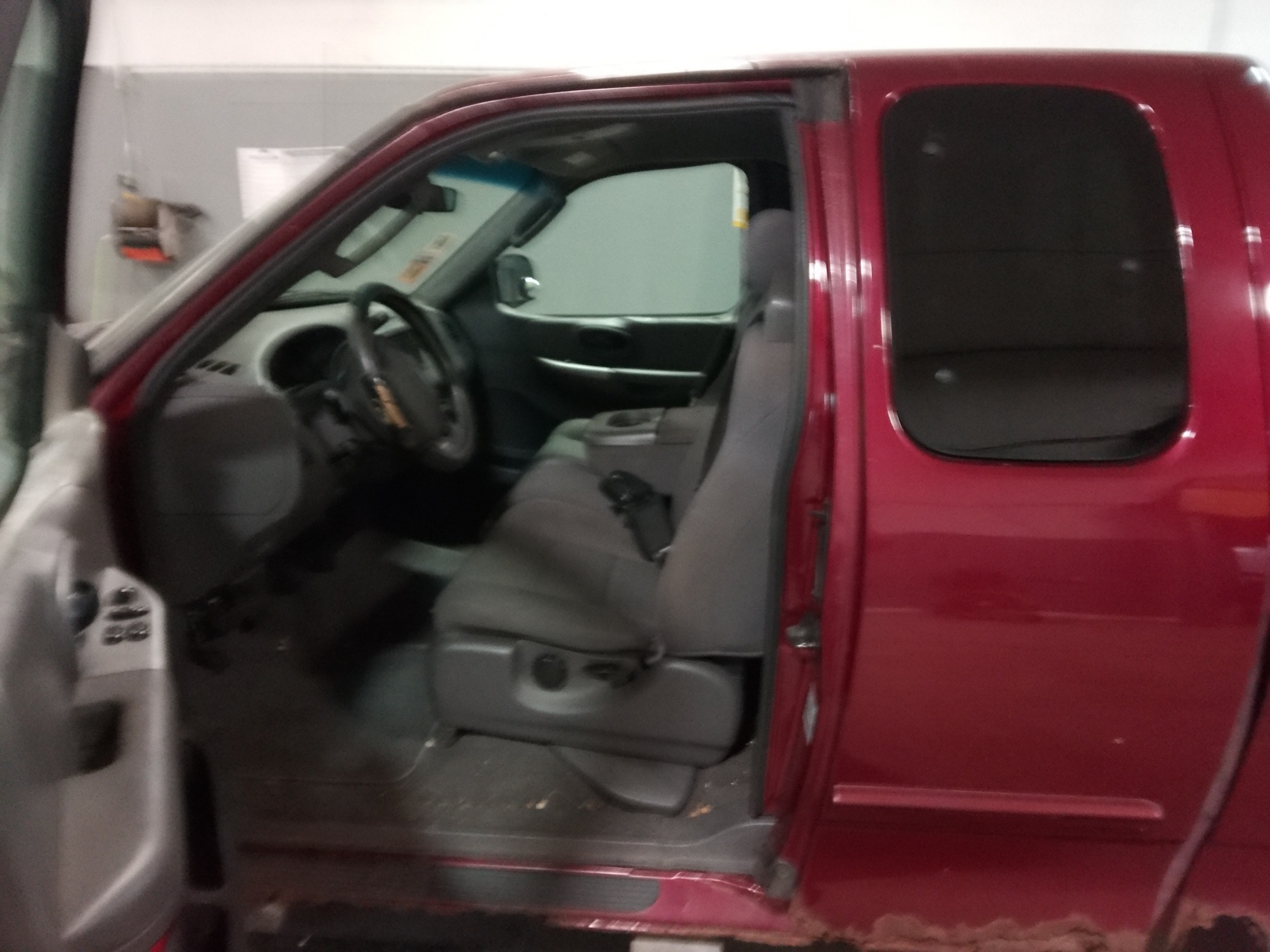2003 ford f-150 xl-supercab-4wd with 200745 miles for sale near elk-river, minnesota 106377_22_driver_seat.jpg