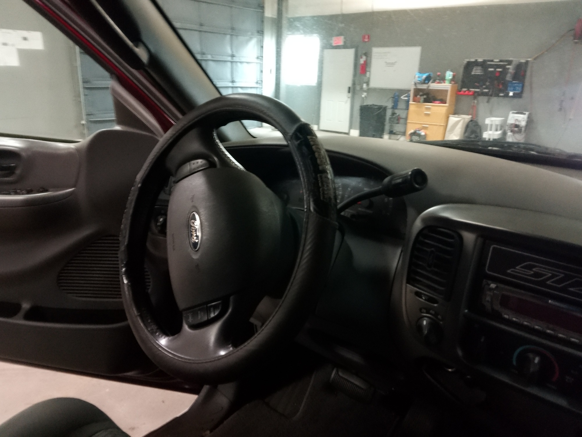 2003 ford f-150 xl-supercab-4wd with 200745 miles for sale near elk-river, minnesota 106377_36_steering_wheel.jpg