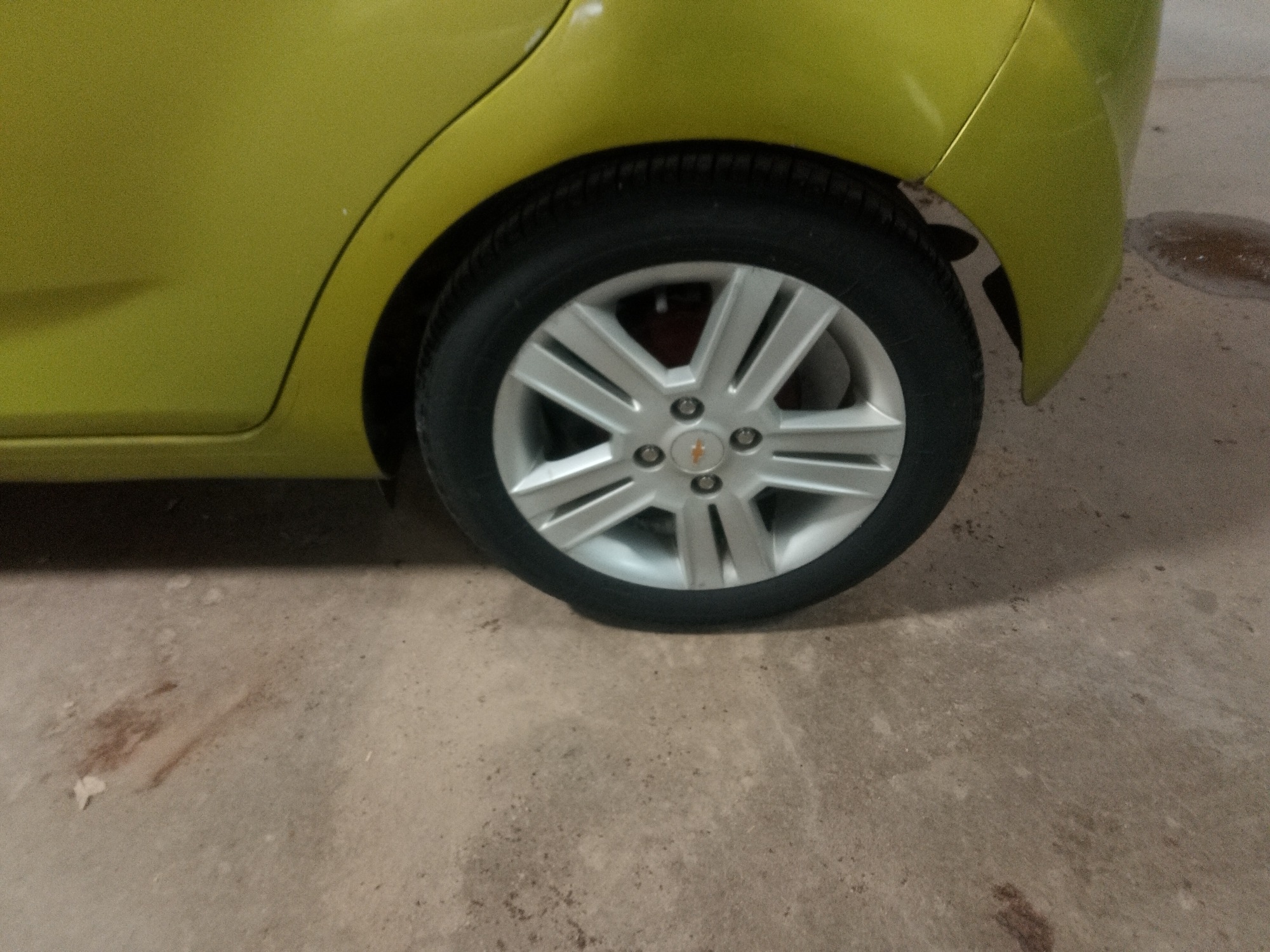 2013 chevrolet spark ls-auto with 108577 miles for sale near elk-river, minnesota 106385_13_rear_drv_wheel.jpg