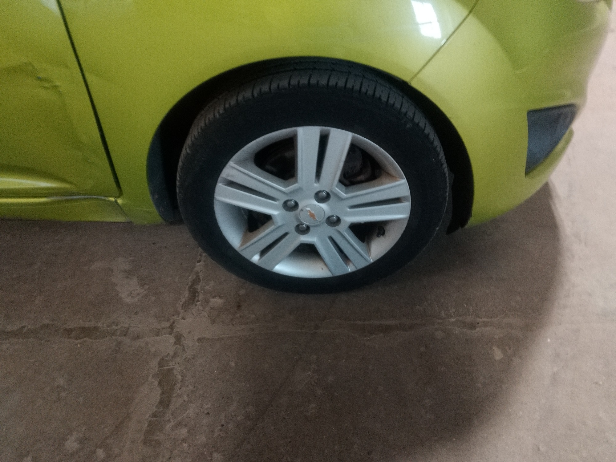 2013 chevrolet spark ls-auto with 108577 miles for sale near elk-river, minnesota 106385_15_front_pass_wheel.jpg