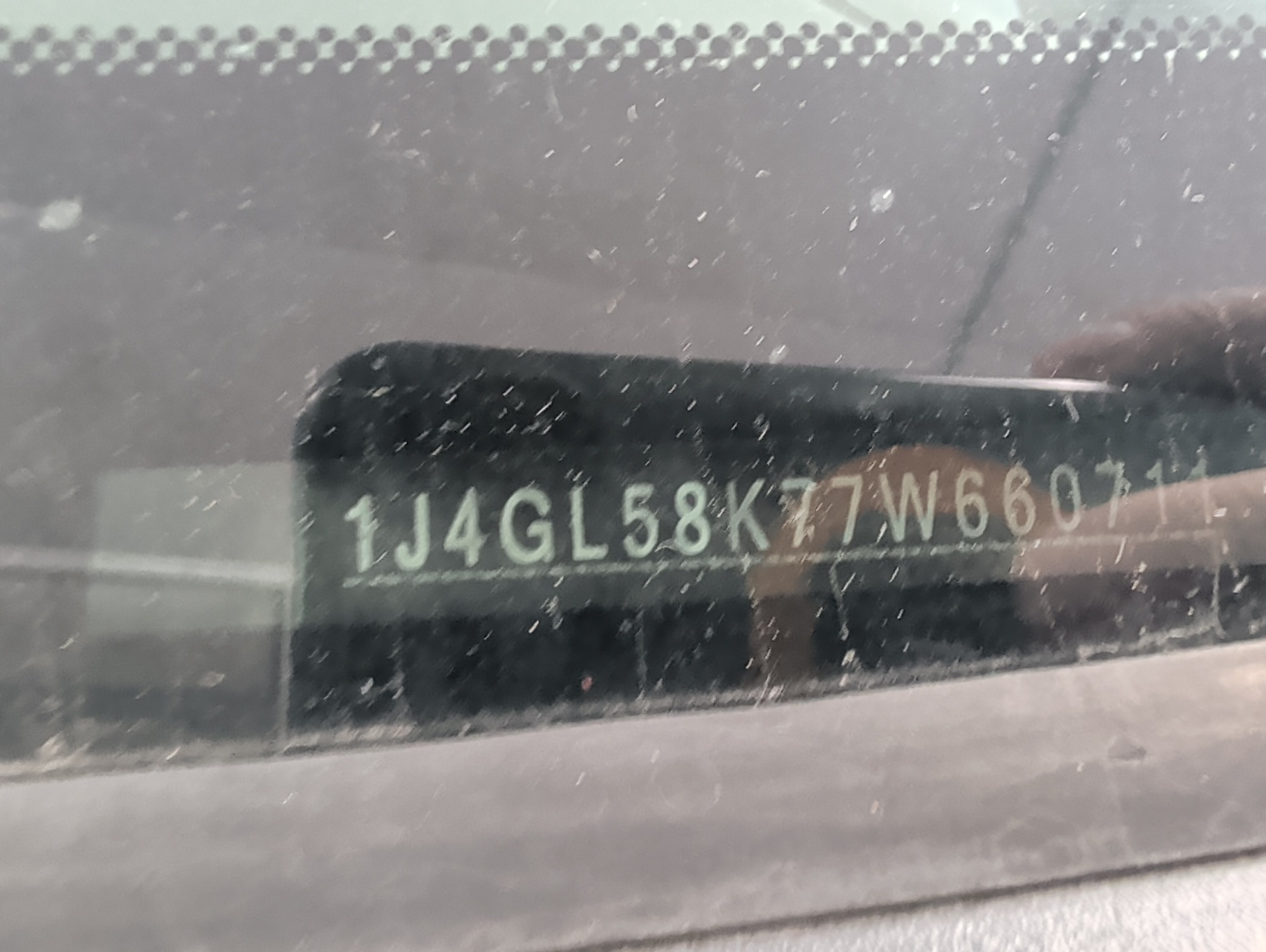 2007 jeep liberty limited-4wd with 169092 miles for sale near elk-river, minnesota 106389_48_windshield_vin_plate.jpg