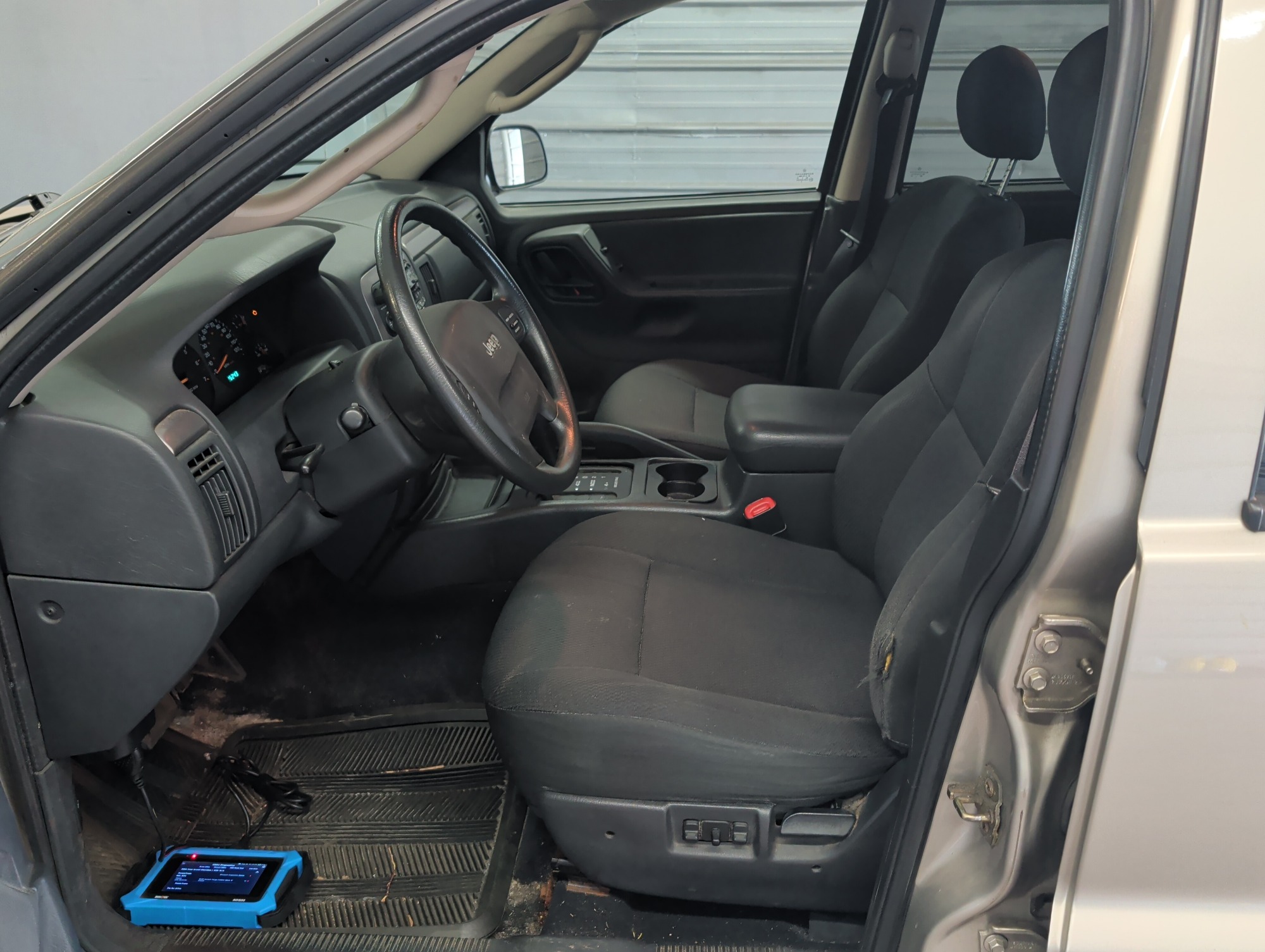 2003 jeep grand-cherokee laredo-4wd with 126243 miles for sale near elk-river, minnesota 106393_22_driver_seat.jpg
