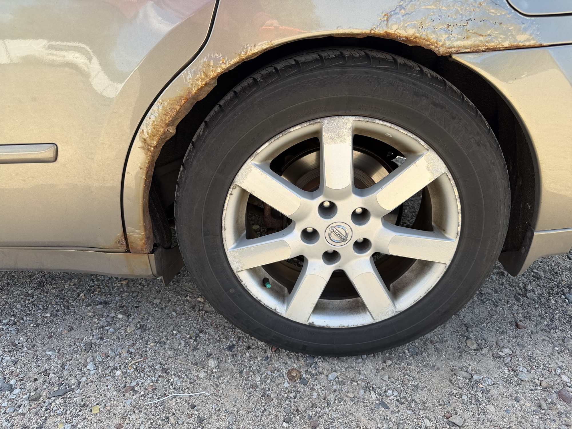 2006 nissan maxima se with 134407 miles for sale near elk-river, minnesota 106396_13_rear_drv_wheel.jpg