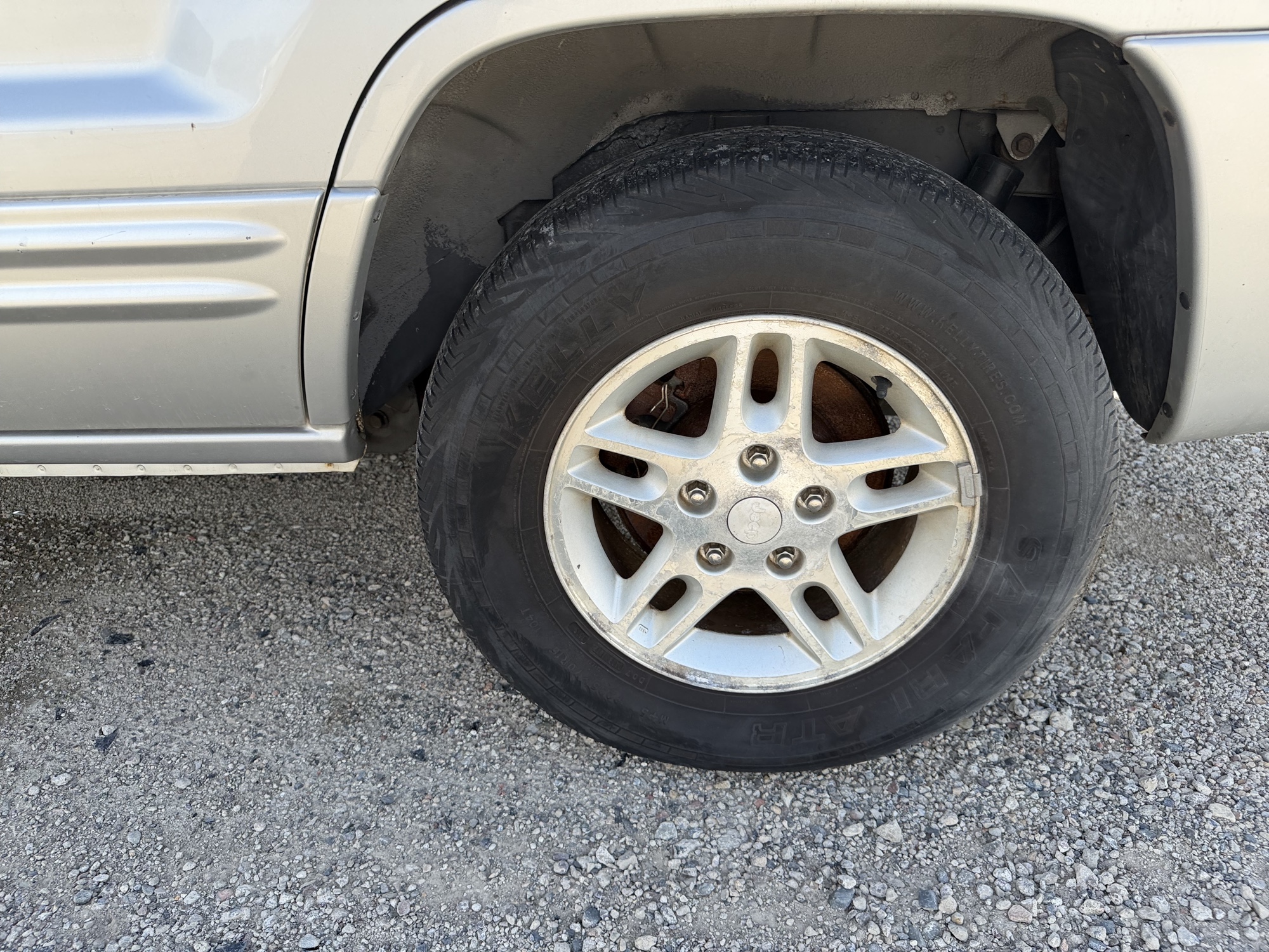 2004 jeep grand-cherokee laredo-2wd with 138807 miles for sale near elk-river, minnesota 106397_13_rear_drv_wheel.jpg