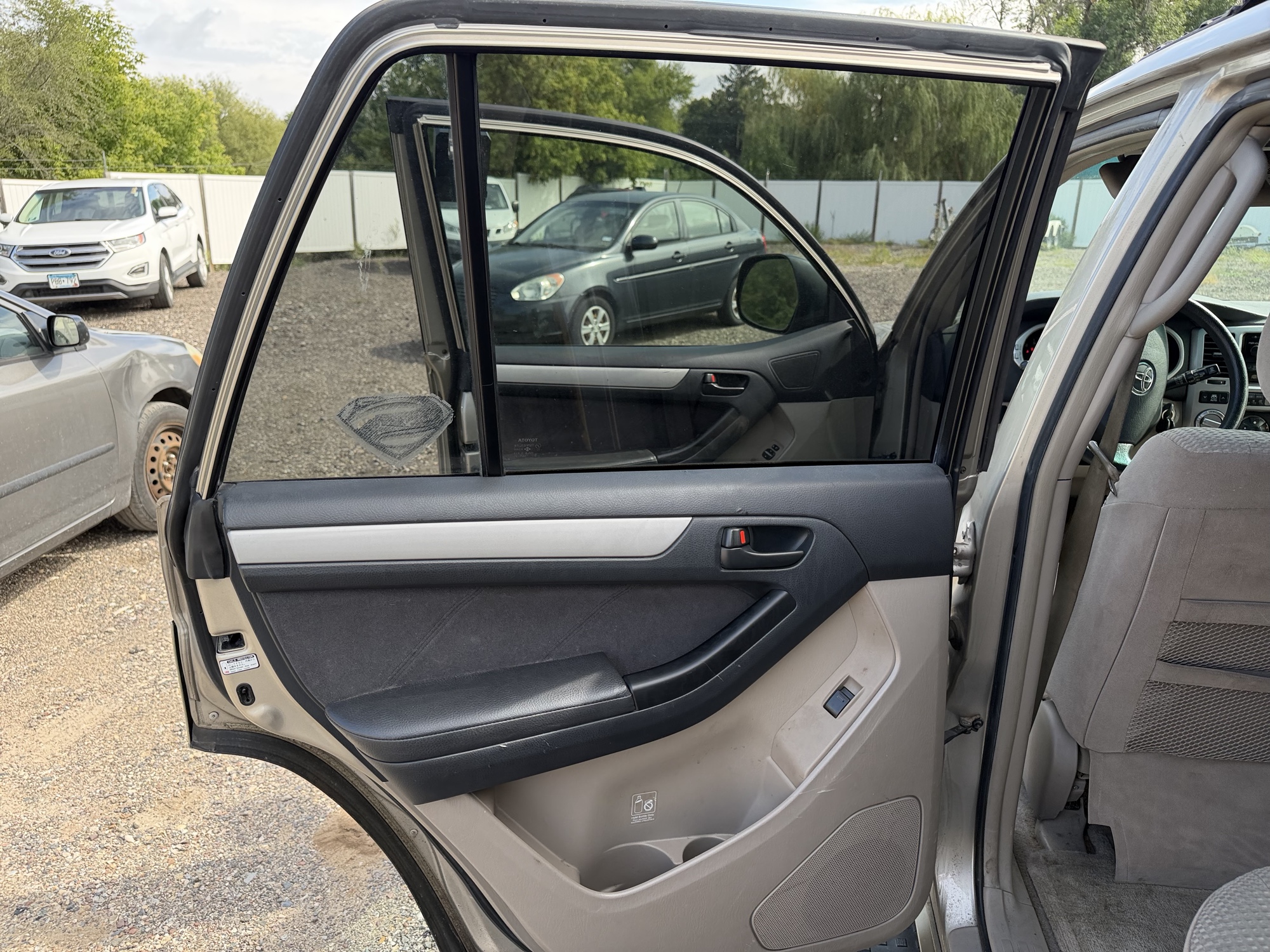 2005 toyota 4runner sport-edition-v6-4wd with 115448 miles for sale near elk-river, minnesota 106402_25_drv_rear_door_panel.jpg