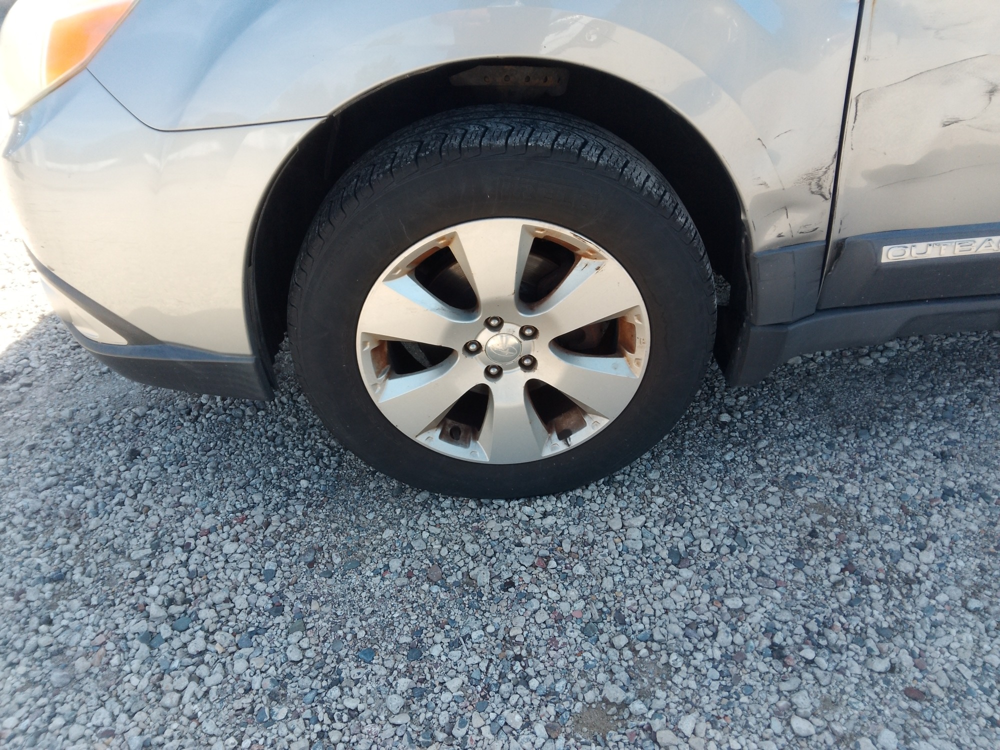 2010 subaru outback with 187512 miles for sale near elk-river, minnesota 106407_12_drv_front_wheel.jpg