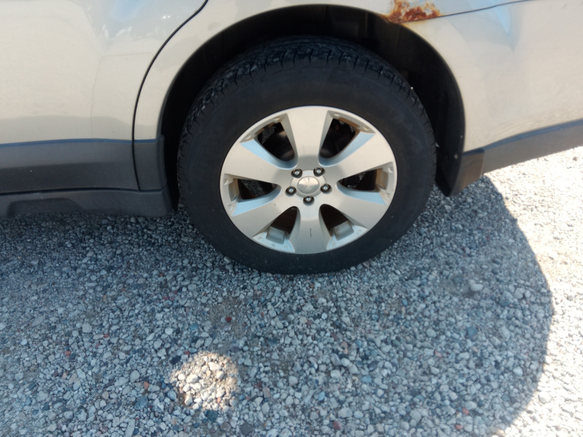 2010 subaru outback with 187512 miles for sale near elk-river, minnesota 106407_13_rear_drv_wheel.jpg