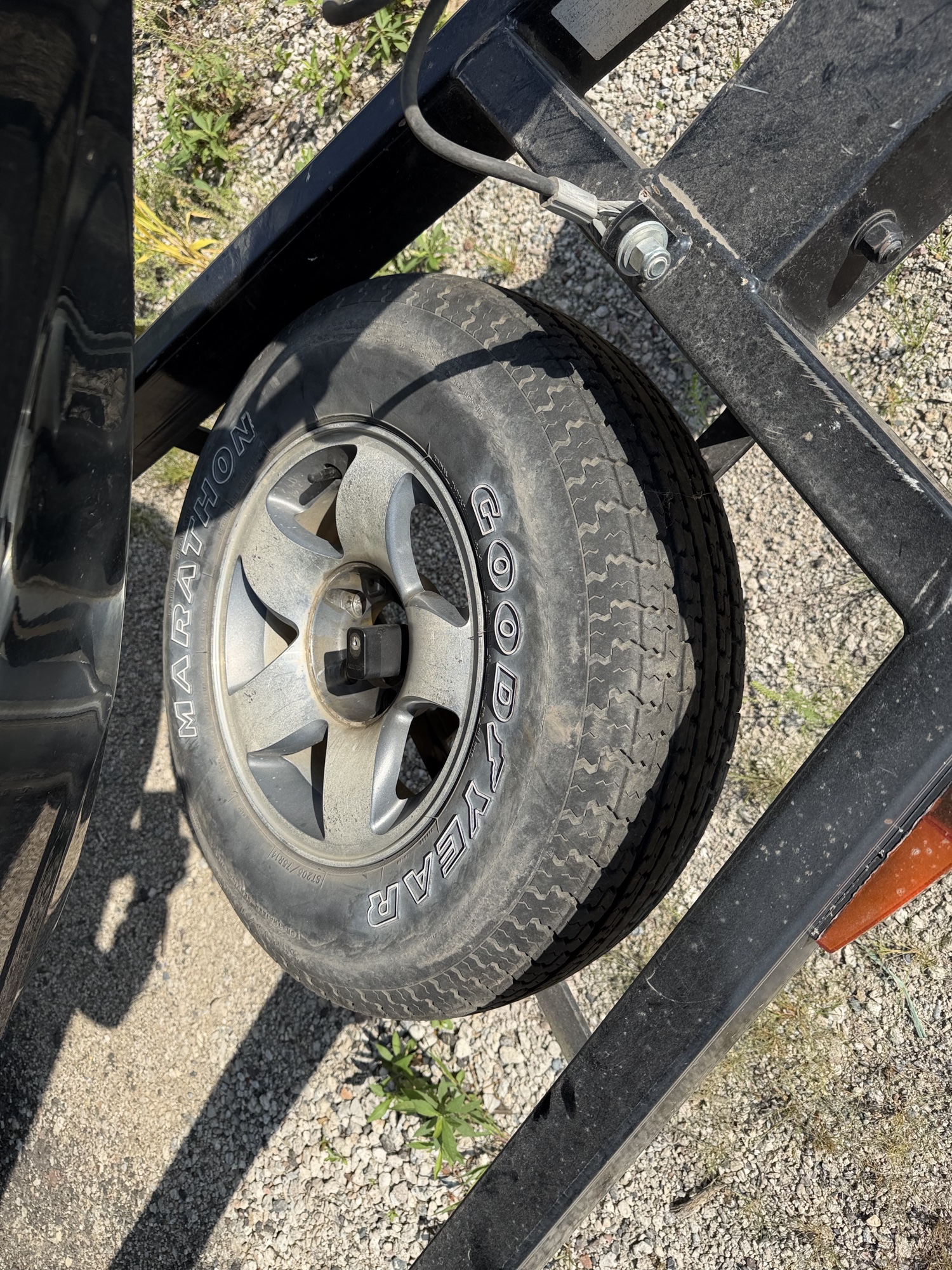 2002 triton 205-dc for sale near elk-river, minnesota 106409_27_spare_tire.jpg