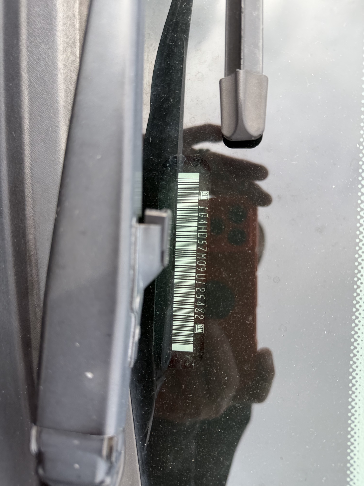 2009 buick lucerne cxl1 with 214213 miles for sale near elk-river, minnesota 106412_48_windshield_vin_plate.jpg