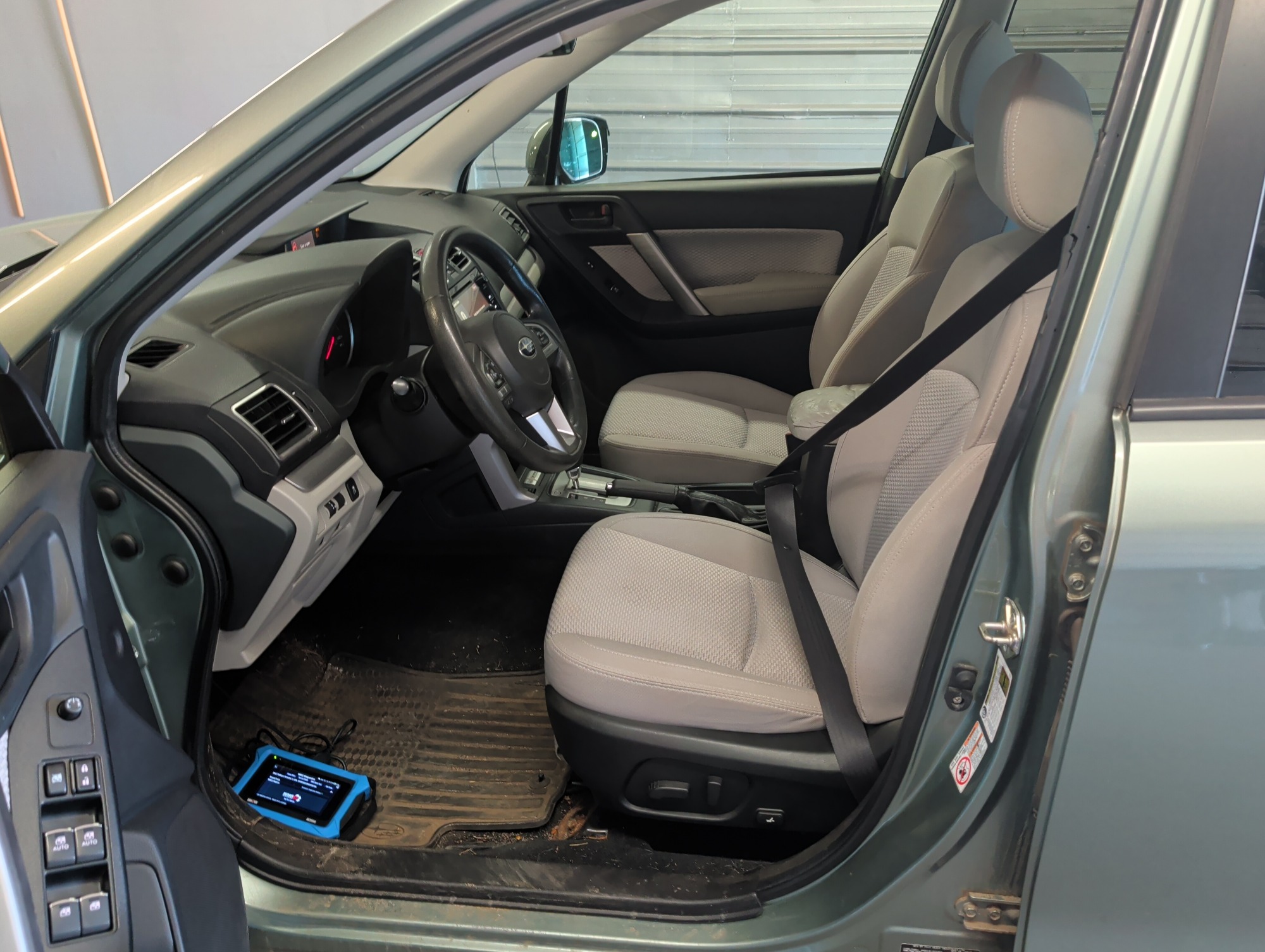 2017 subaru forester 2.5i-premium-pzev-cvt with 119029 miles for sale near elk-river, minnesota 106413_22_driver_seat.jpg