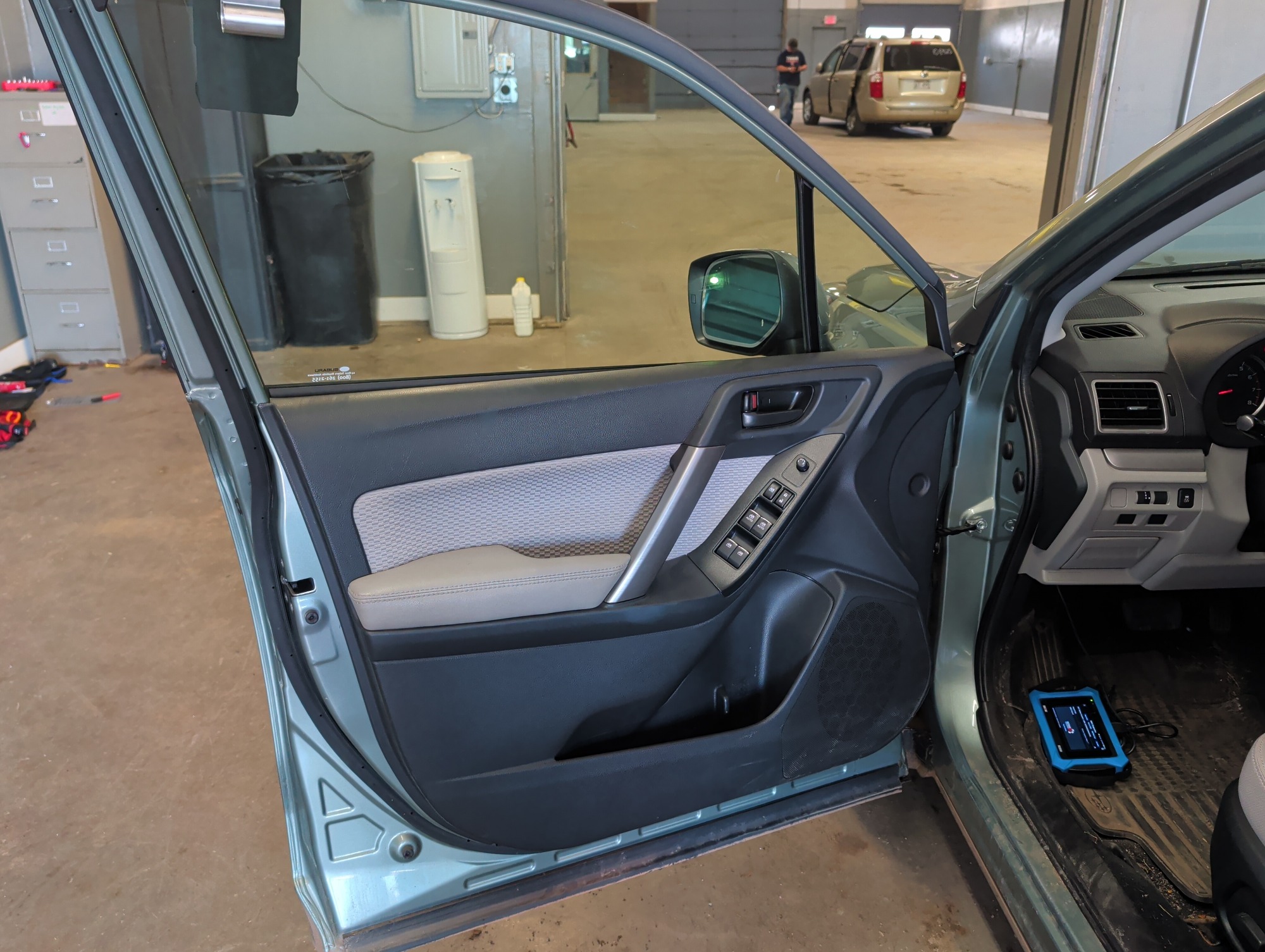 2017 subaru forester 2.5i-premium-pzev-cvt with 119029 miles for sale near elk-river, minnesota 106413_23_driver_door_panel.jpg