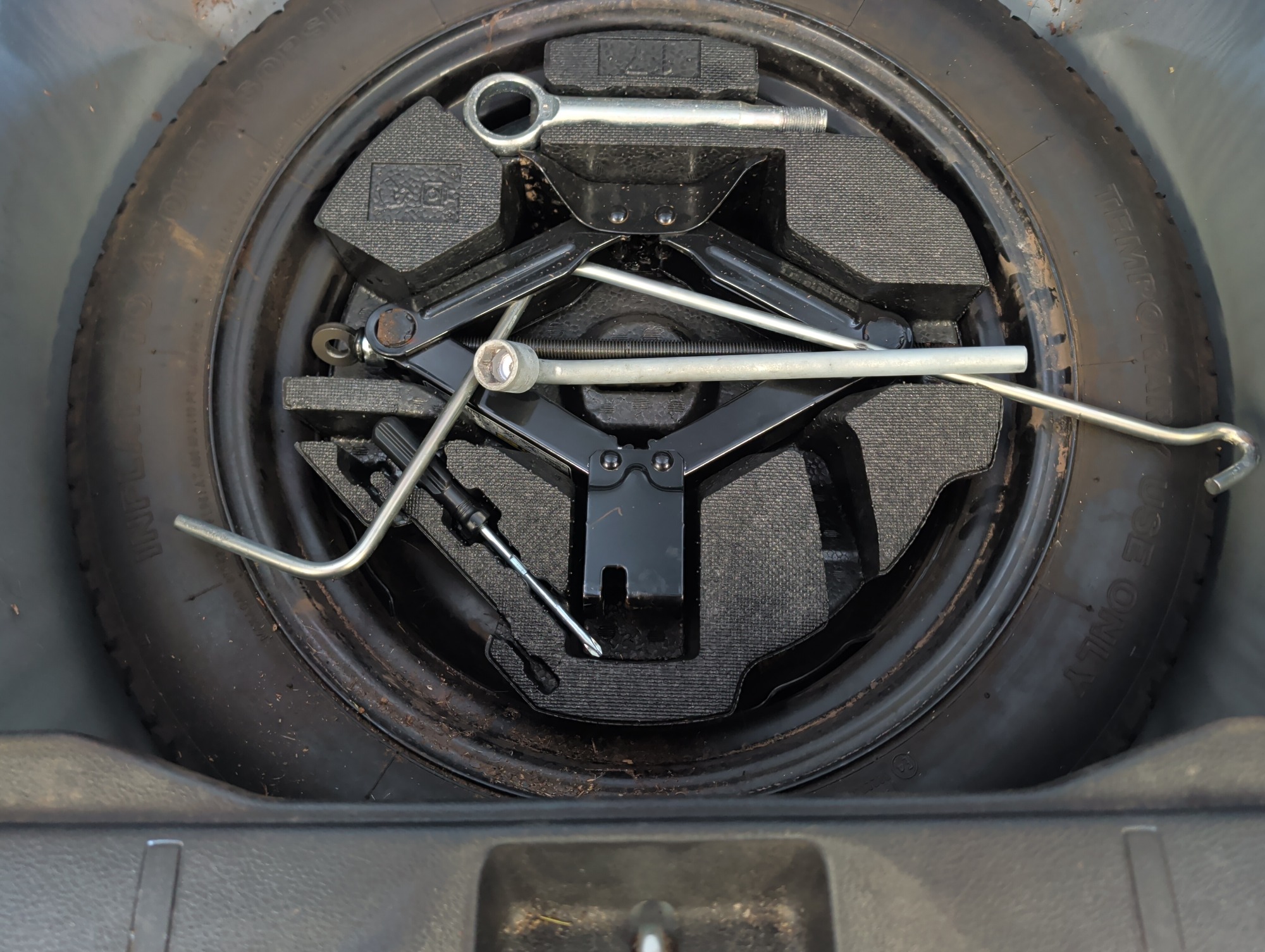2017 subaru forester 2.5i-premium-pzev-cvt with 119029 miles for sale near elk-river, minnesota 106413_27_spare_tire.jpg
