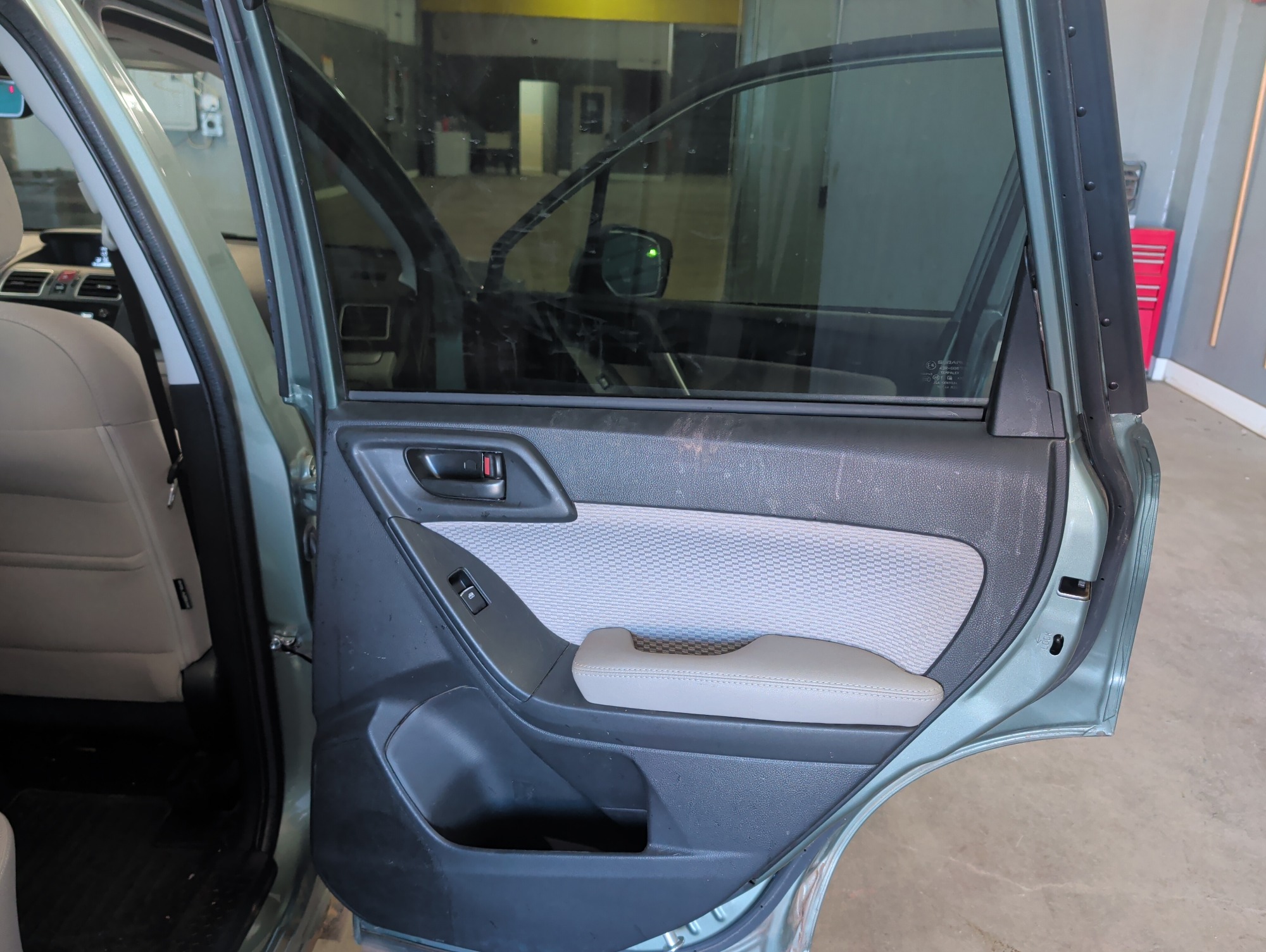 2017 subaru forester 2.5i-premium-pzev-cvt with 119029 miles for sale near elk-river, minnesota 106413_30_pass_rear_door_panel.jpg