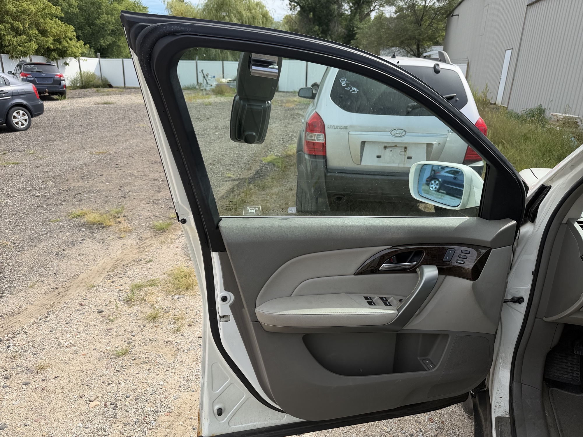 2011 acura mdx 6-spd-at-w-tech-package with 135189 miles for sale near elk-river, minnesota 106414_23_driver_door_panel.jpg