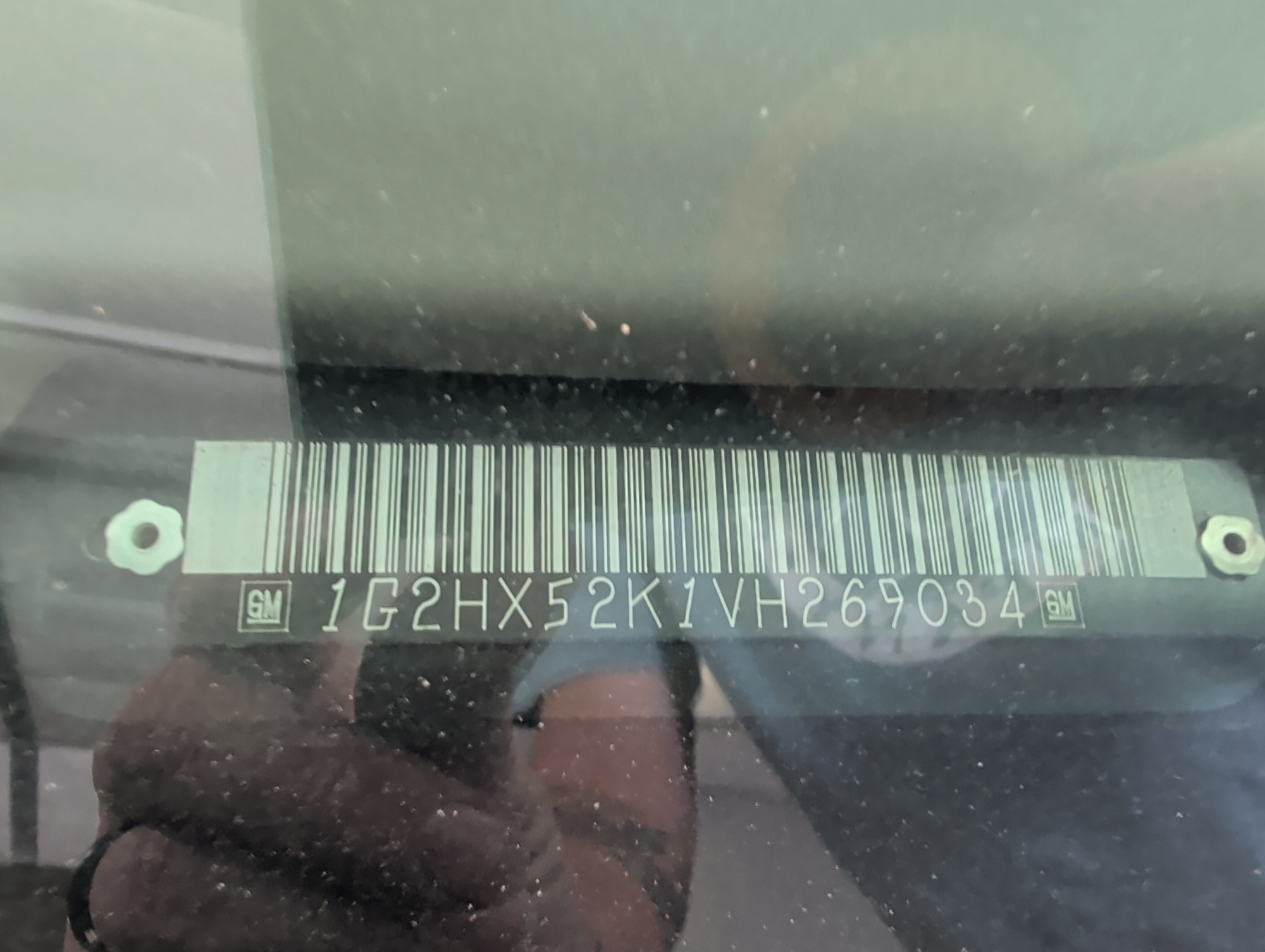 1997 pontiac bonneville se with 97947 miles for sale near elk-river, minnesota 106415_48_windshield_vin_plate.jpg