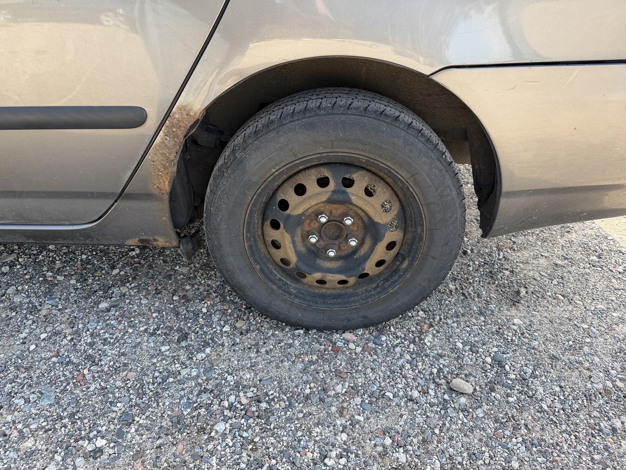 2007 toyota corolla ce with 165644 miles for sale near elk-river, minnesota 106417_13_rear_drv_wheel.jpg