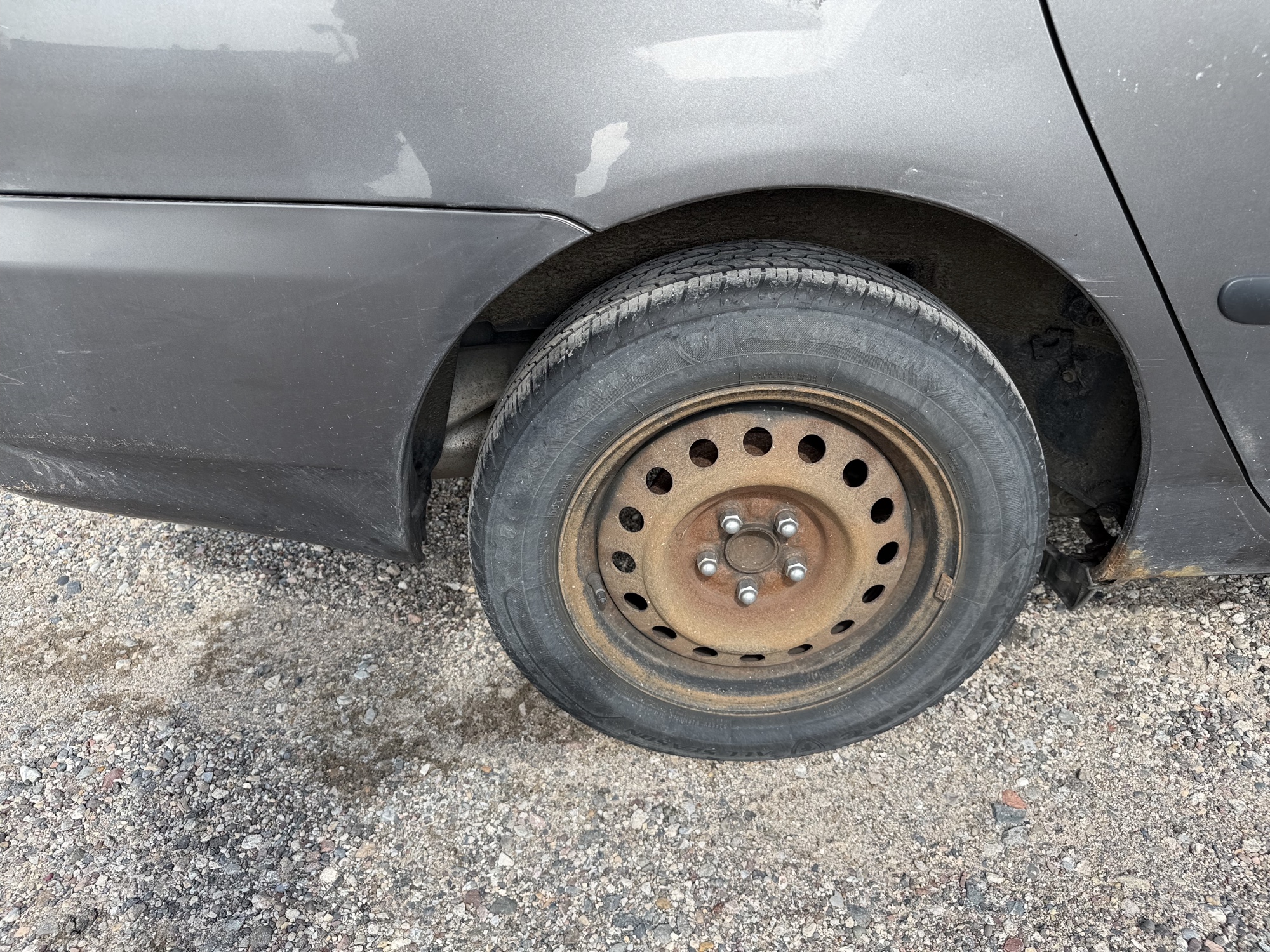 2007 toyota corolla ce with 165644 miles for sale near elk-river, minnesota 106417_14_rear_pass_wheel.jpg