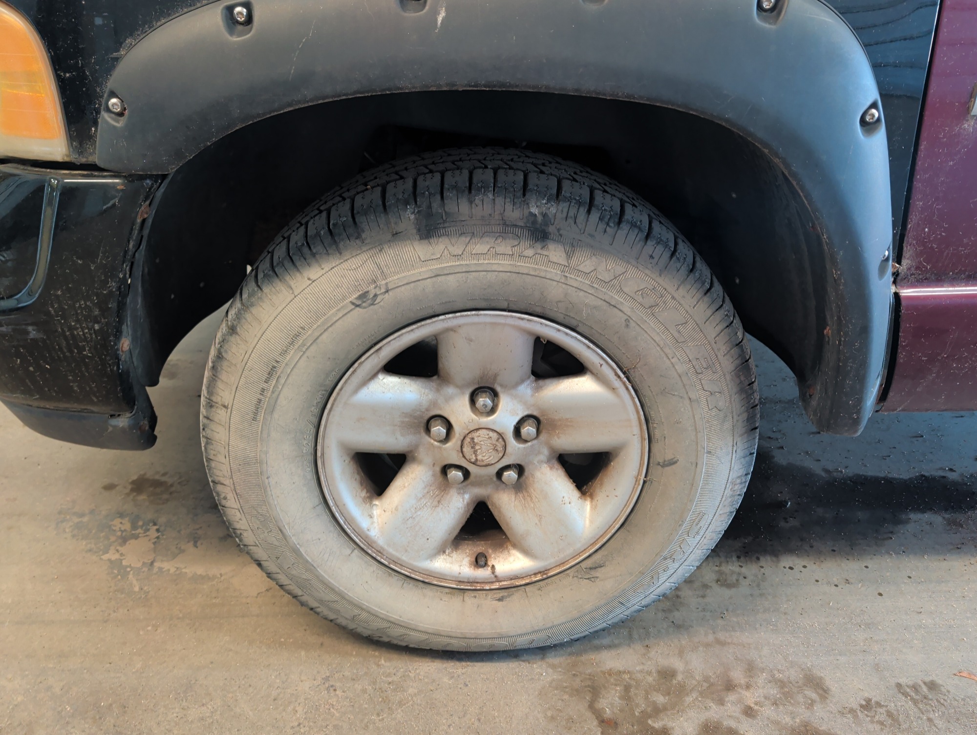 2002 dodge ram-1500 st-quad-cab-short-bed-4wd with 216281 miles for sale near elk-river, minnesota 106418_12_drv_front_wheel.jpg