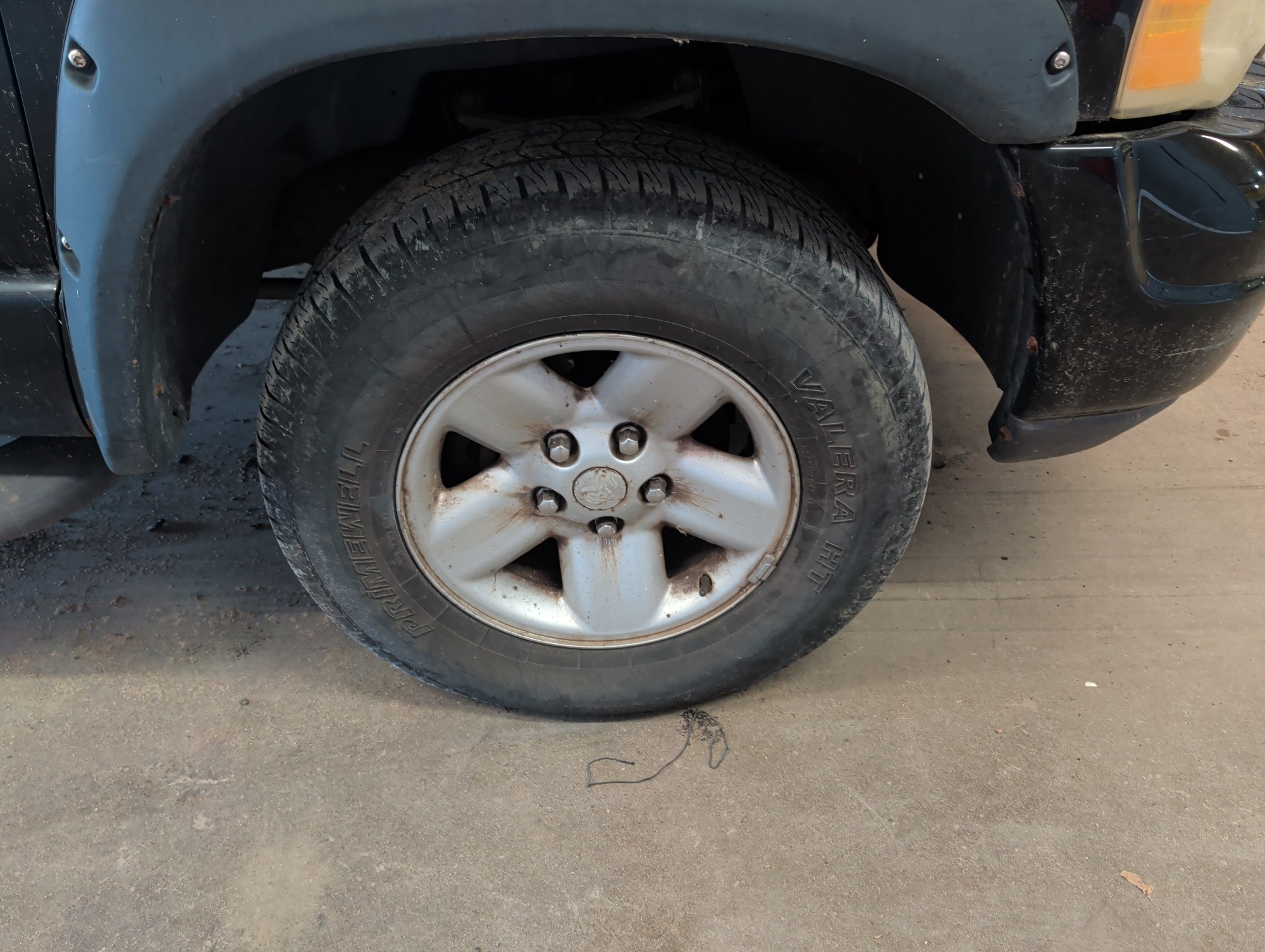 2002 dodge ram-1500 st-quad-cab-short-bed-4wd with 216281 miles for sale near elk-river, minnesota 106418_15_front_pass_wheel.jpg