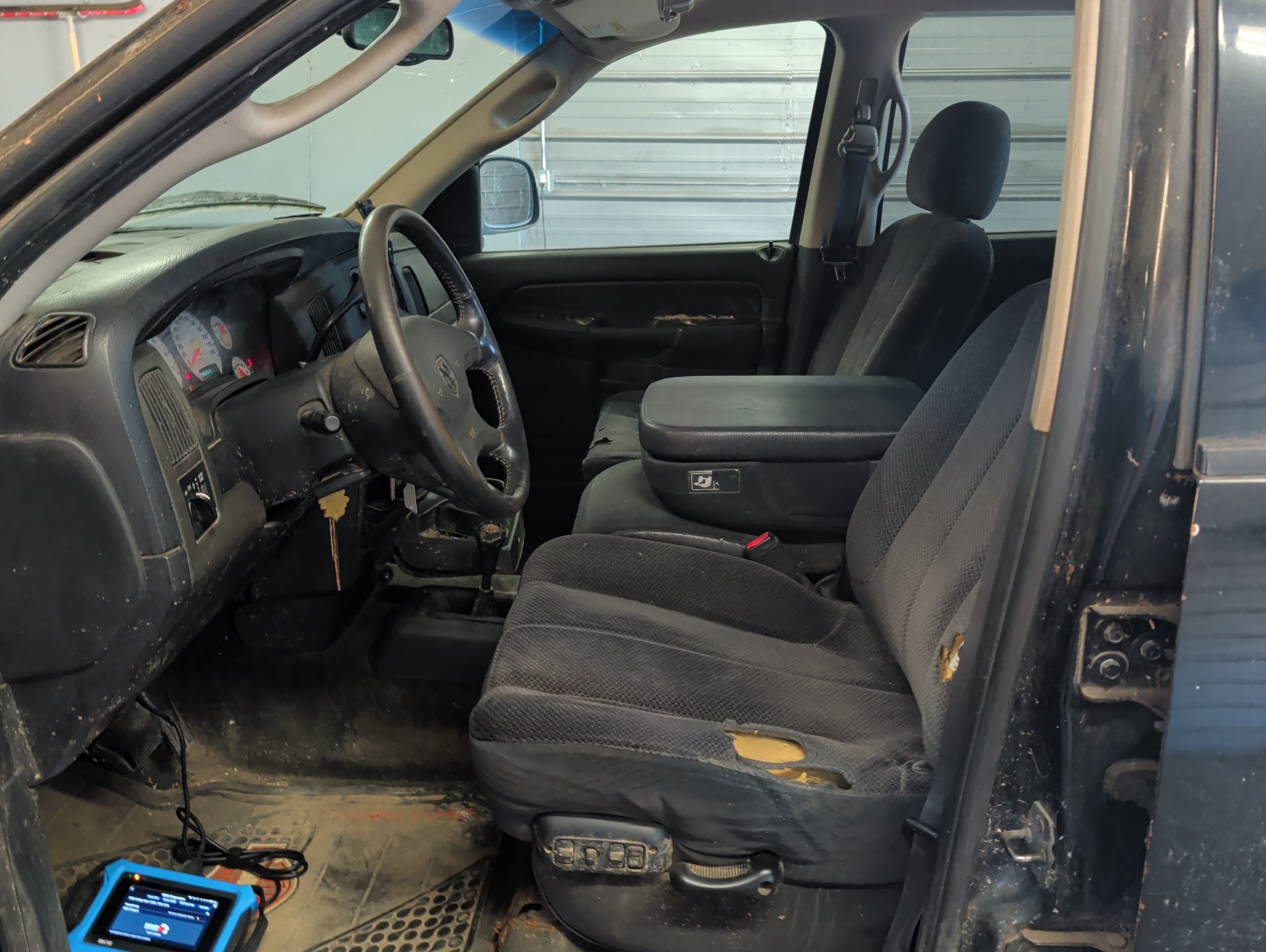 2002 dodge ram-1500 st-quad-cab-short-bed-4wd with 216281 miles for sale near elk-river, minnesota 106418_22_driver_seat.jpg