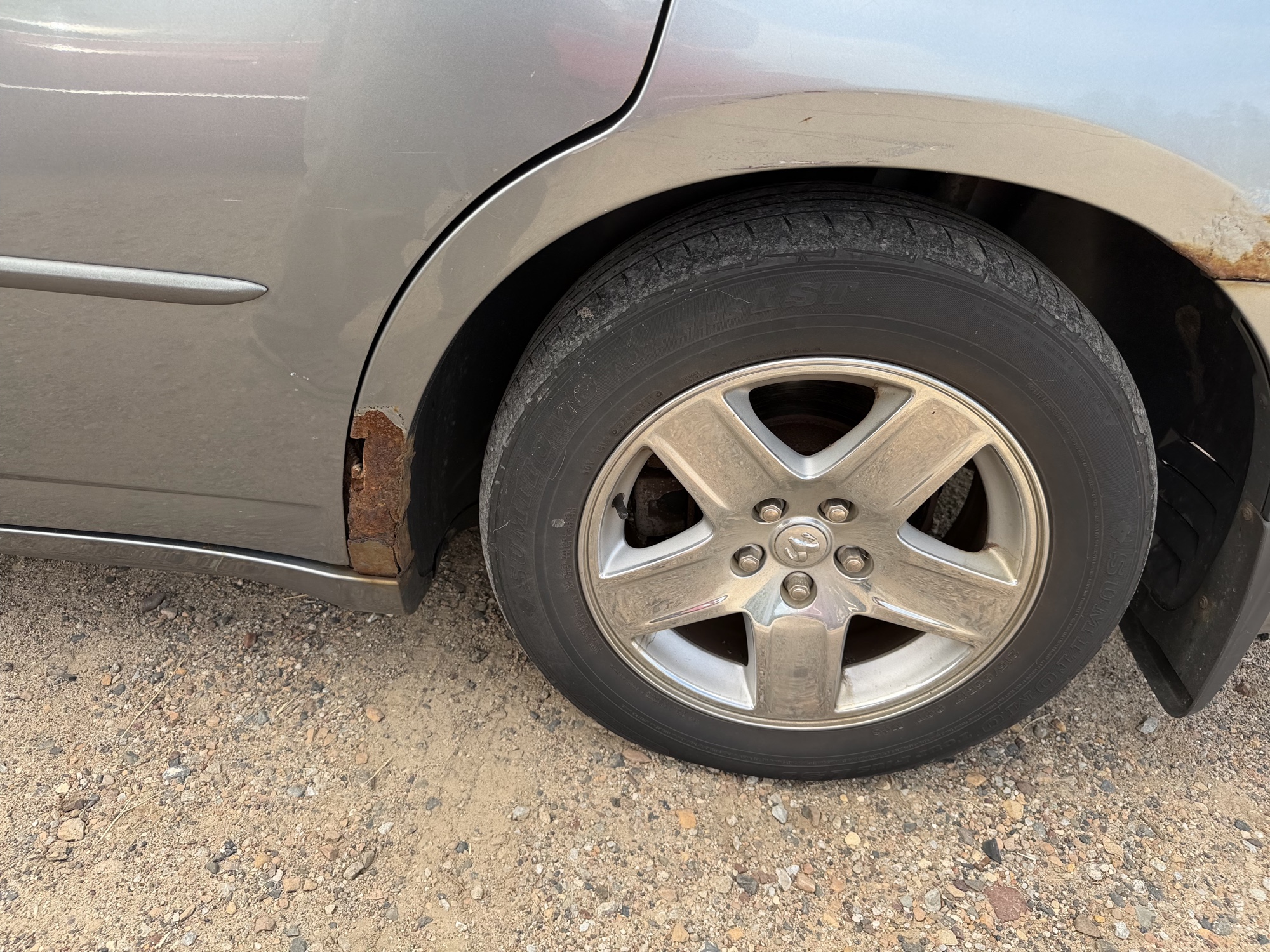 2006 dodge charger base with 164904 miles for sale near elk-river, minnesota 106434_13_rear_drv_wheel.jpg