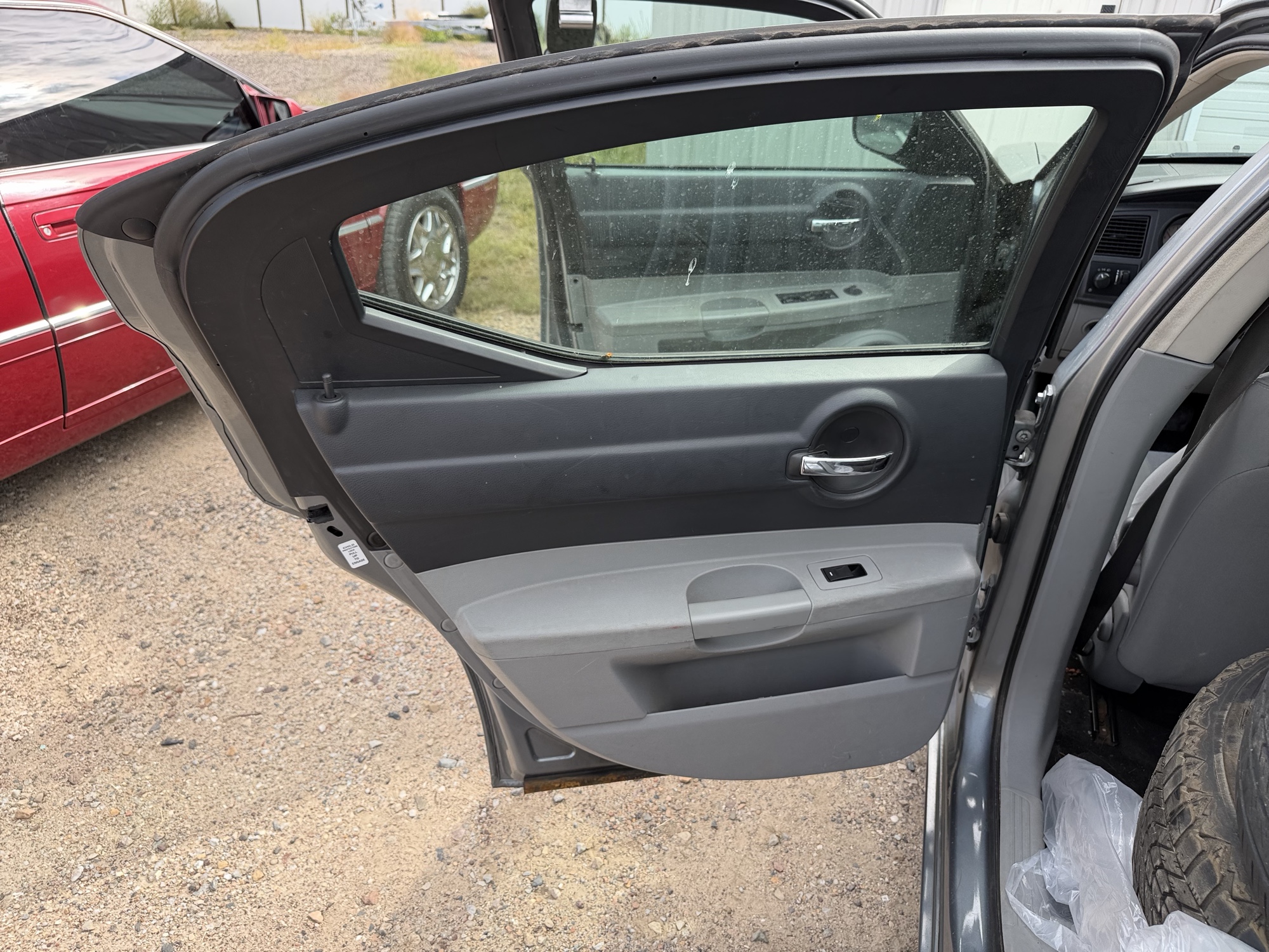 2006 dodge charger base with 164904 miles for sale near elk-river, minnesota 106434_25_drv_rear_door_panel.jpg