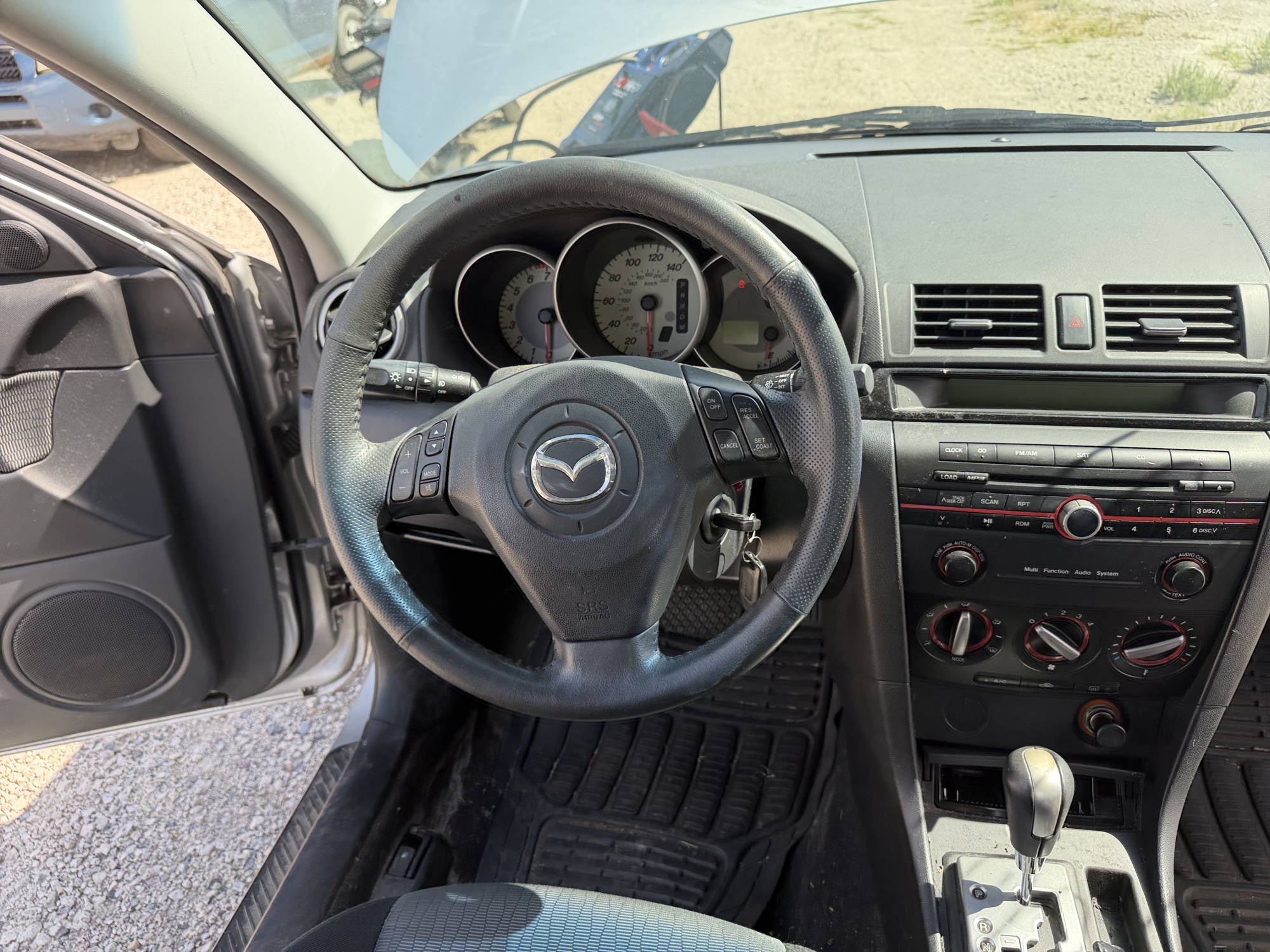 2008 mazda mazda3 i-sport-4-door with 106057 miles for sale near elk-river, minnesota 106437_34_whole_dash.jpg