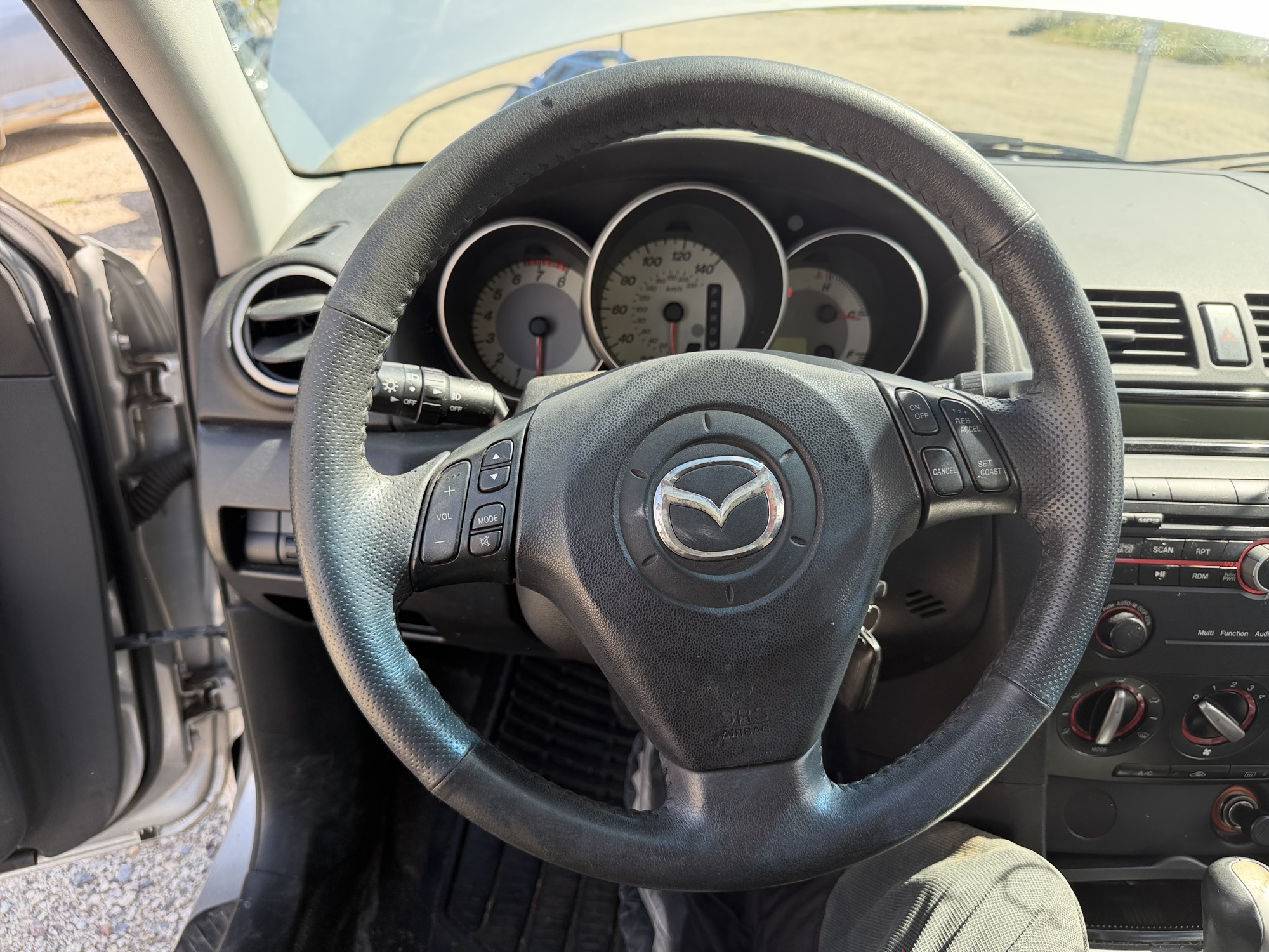 2008 mazda mazda3 i-sport-4-door with 106057 miles for sale near elk-river, minnesota 106437_36_steering_wheel.jpg