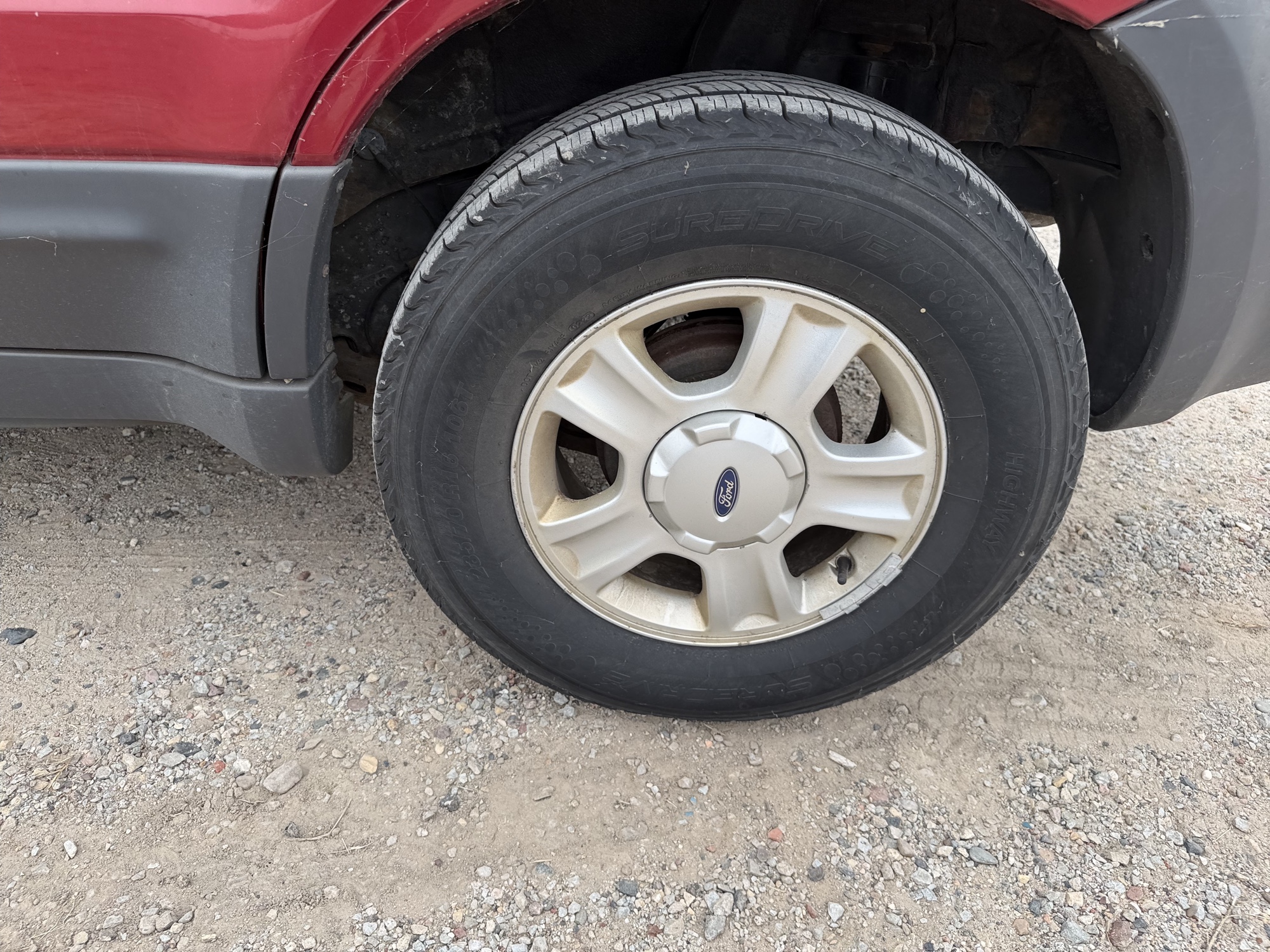 2004 ford escape xlt-2wd with 178342 miles for sale near elk-river, minnesota 106441_13_rear_drv_wheel.jpg