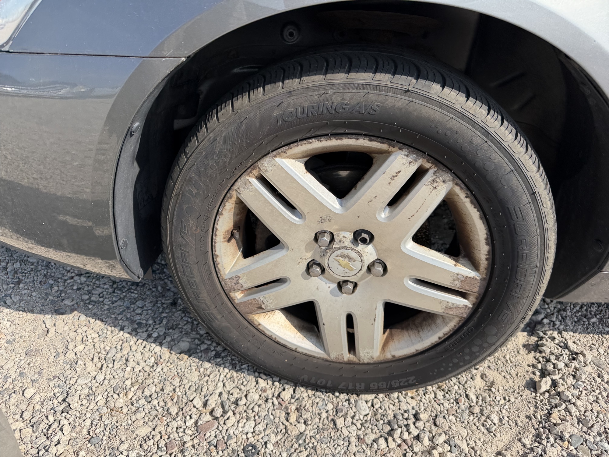 2006 chevrolet impala with 107595 miles for sale near elk-river, minnesota 106444_12_drv_front_wheel.jpg