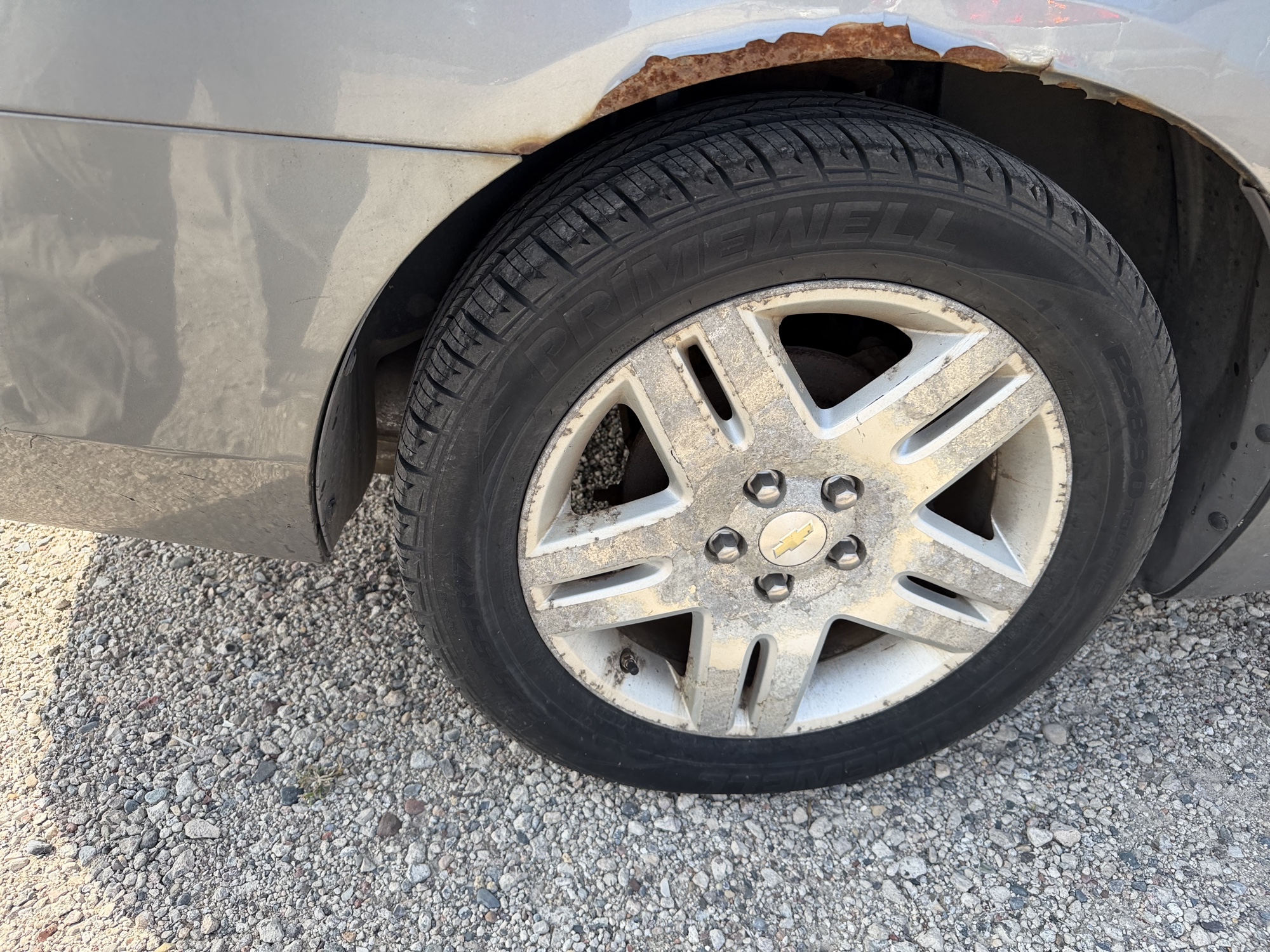 2006 chevrolet impala with 107595 miles for sale near elk-river, minnesota 106444_14_rear_pass_wheel.jpg