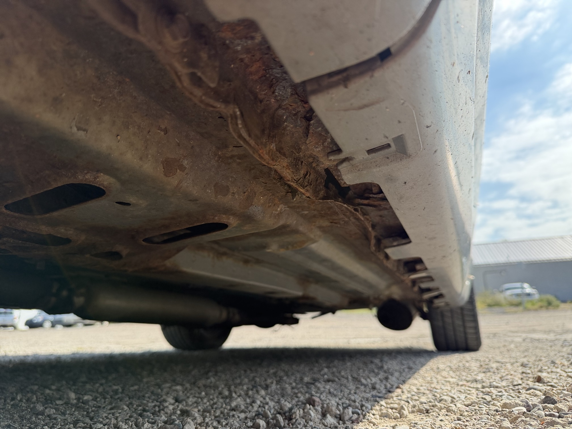 2006 chevrolet impala with 107595 miles for sale near elk-river, minnesota 106444_17_undercar_drv_side.jpg