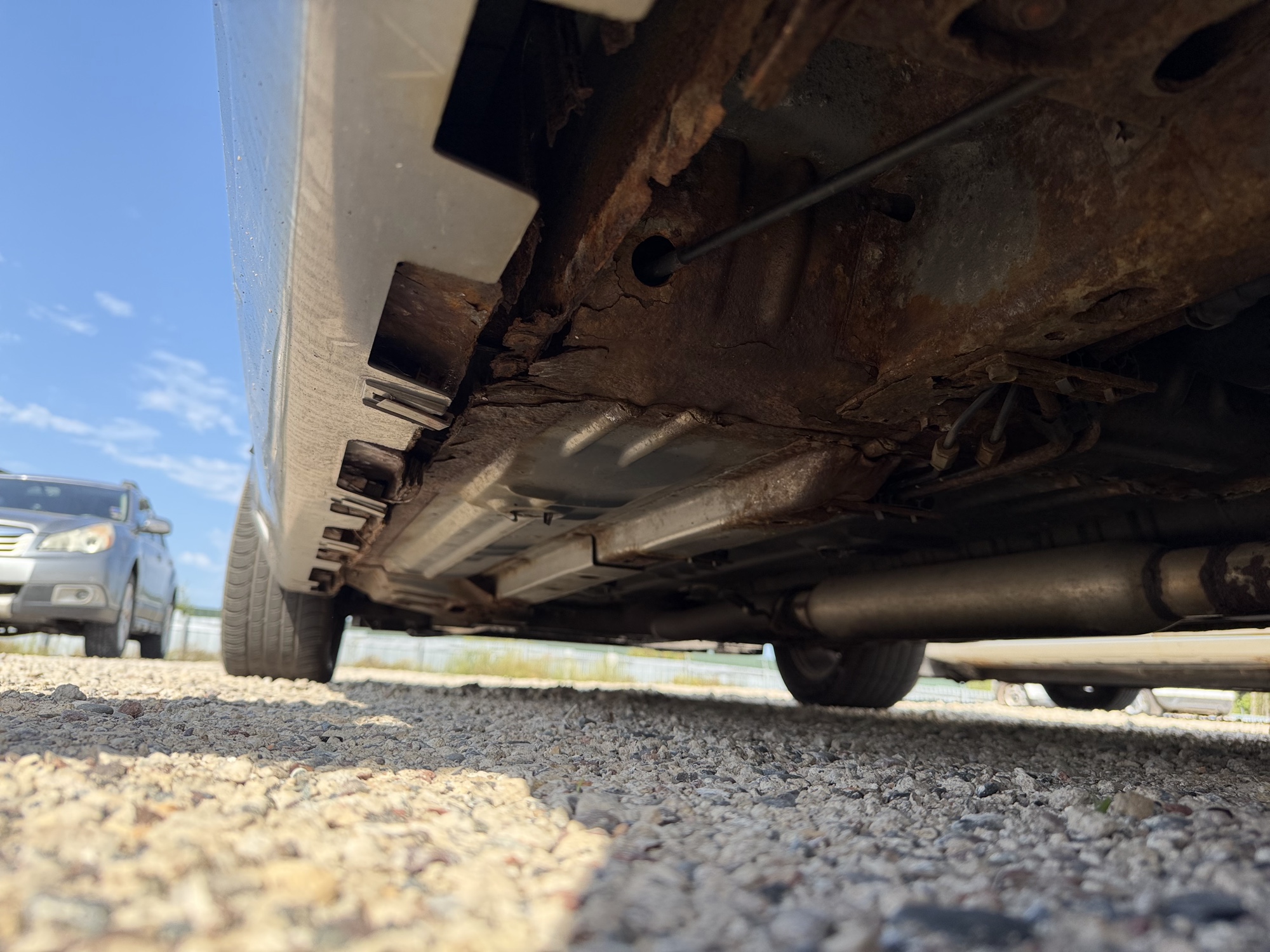 2006 chevrolet impala with 107595 miles for sale near elk-river, minnesota 106444_18_undercar_rear_drv.jpg