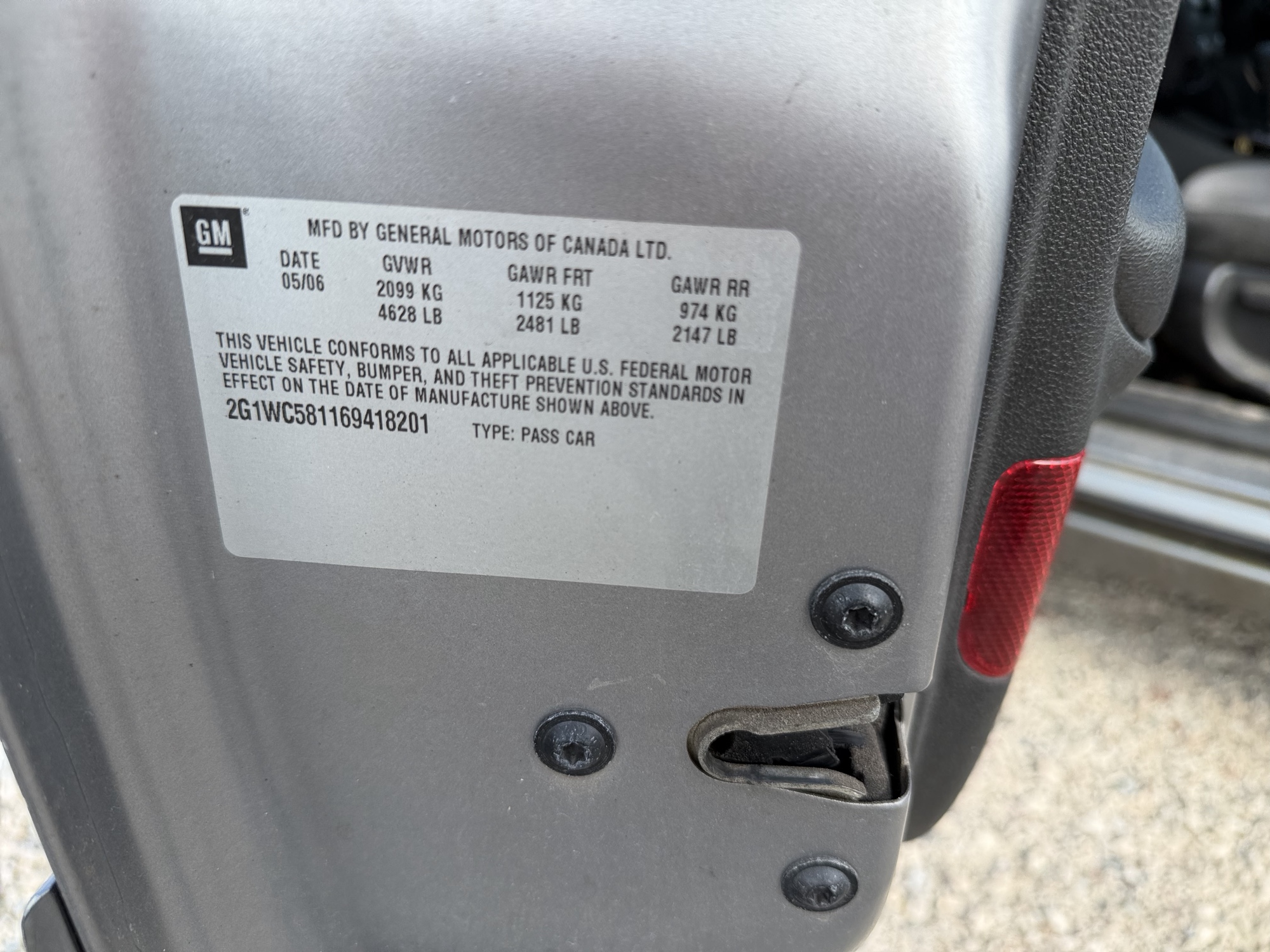 2006 chevrolet impala with 107595 miles for sale near elk-river, minnesota 106444_47_door_vin_sticker.jpg