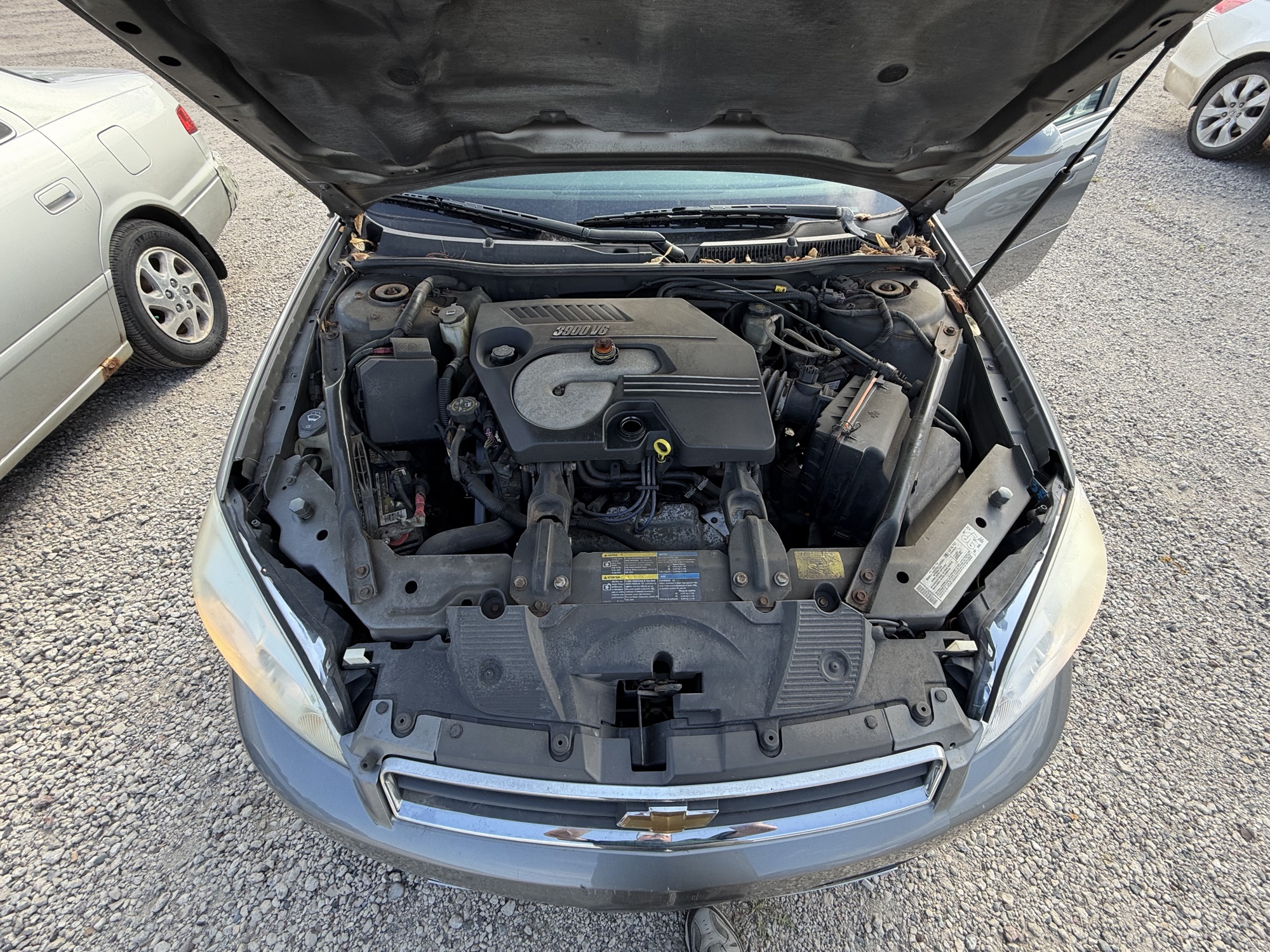 2006 chevrolet impala with 107595 miles for sale near elk-river, minnesota 106444_49_engine_bay.jpg