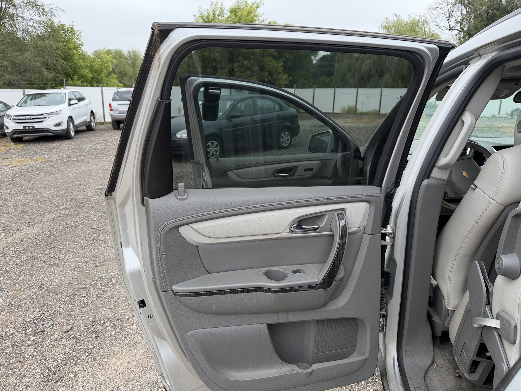 2014 chevrolet traverse ltz-awd with 293494 miles for sale near elk-river, minnesota 106460_25_drv_rear_door_panel.jpg
