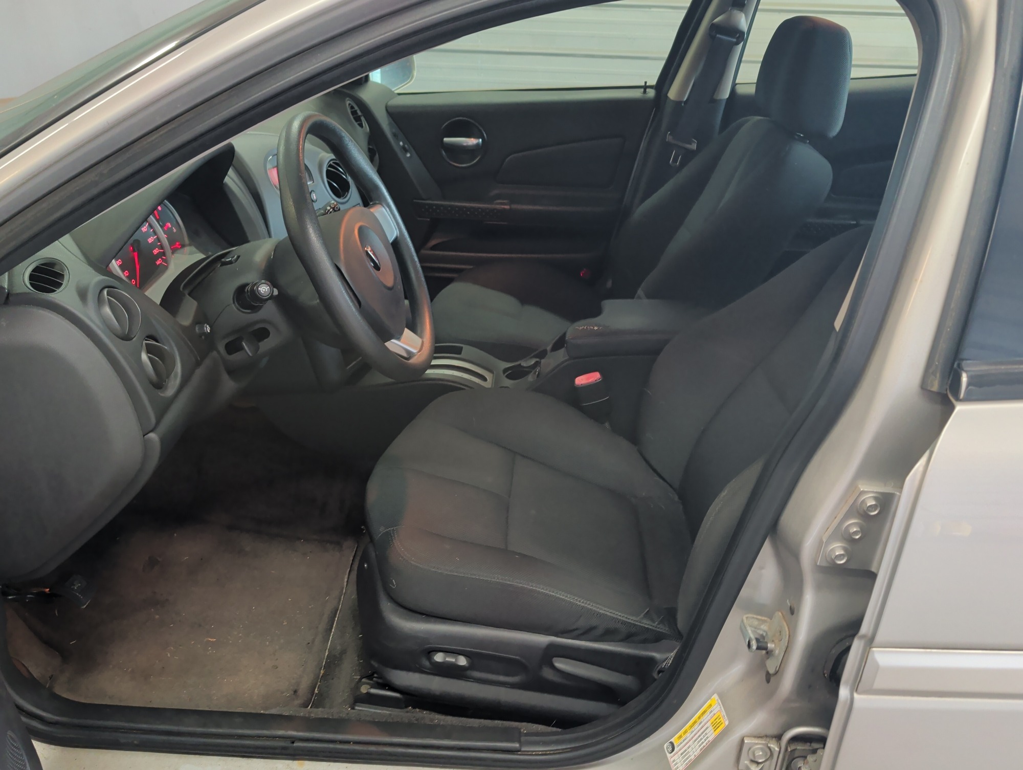 2007 pontiac grand-prix sedan with 184147 miles for sale near elk-river, minnesota 106461_22_driver_seat.jpg