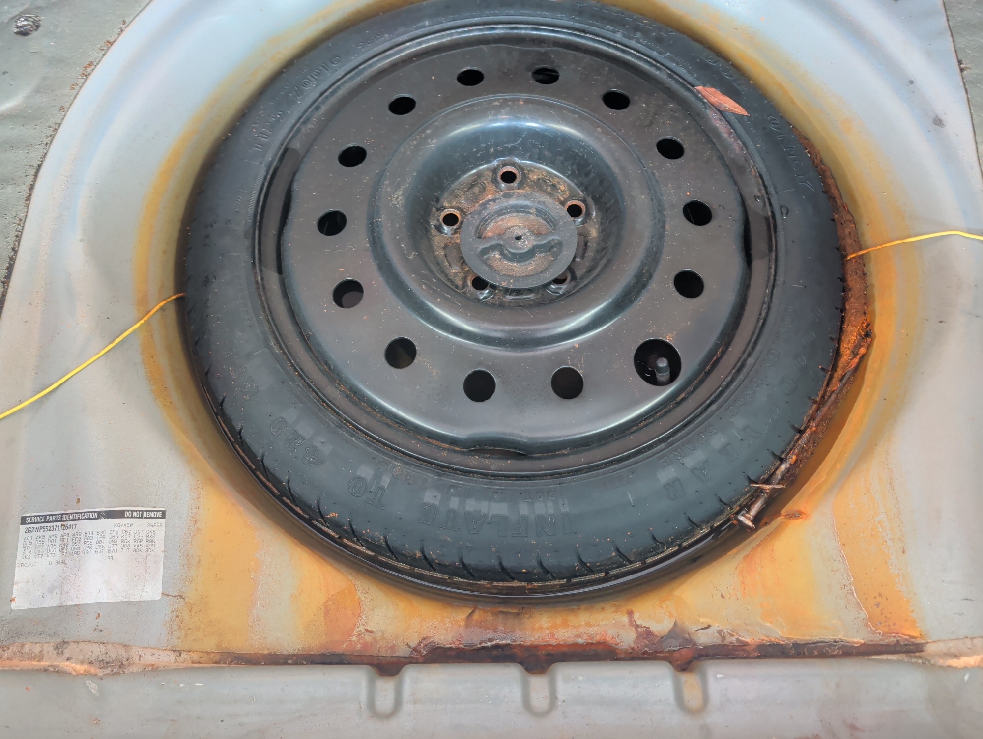 2007 pontiac grand-prix sedan with 184147 miles for sale near elk-river, minnesota 106461_27_spare_tire.jpg