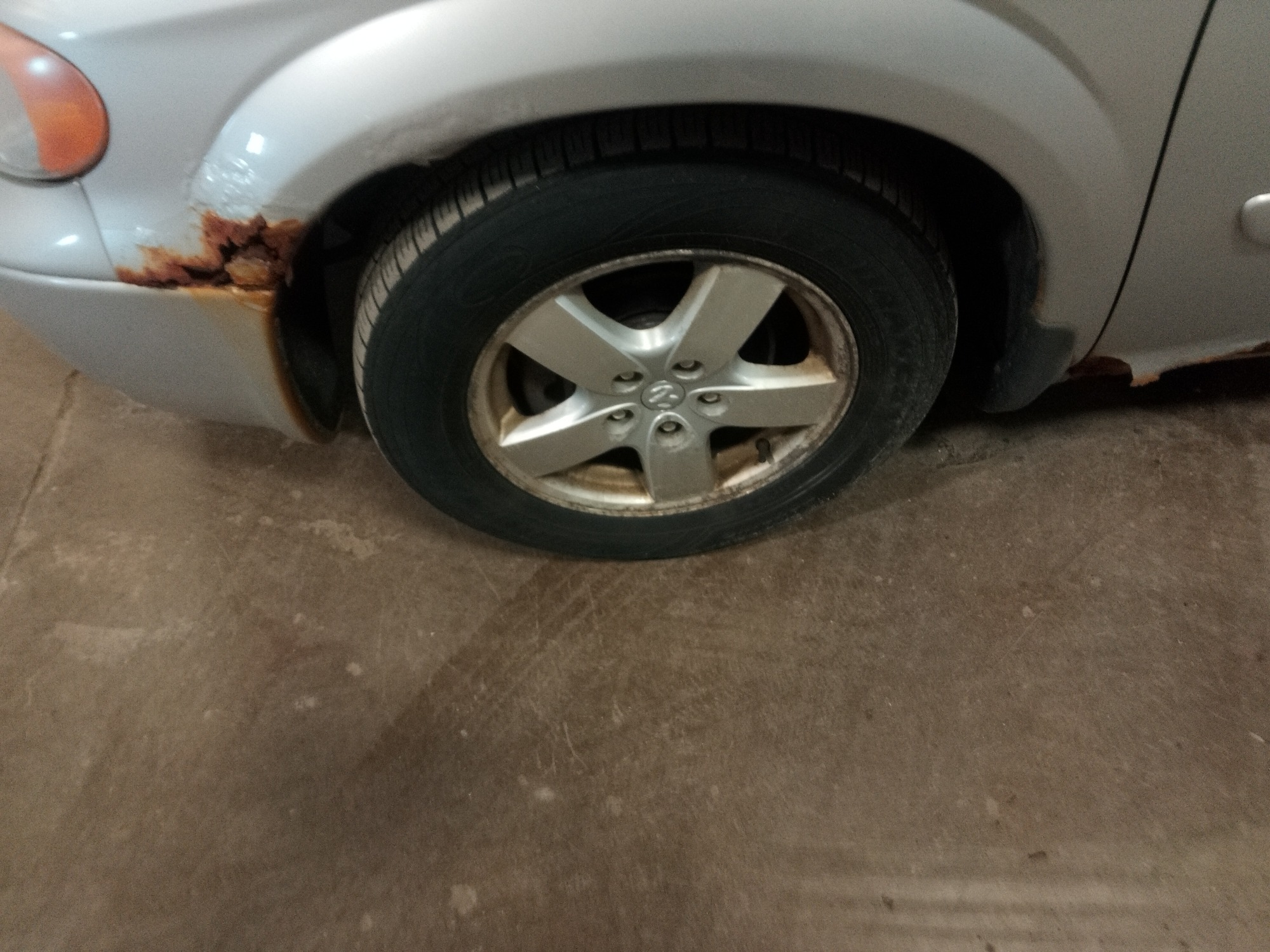 2005 dodge grand-caravan sxt with 208381 miles for sale near elk-river, minnesota 106468_12_drv_front_wheel.jpg