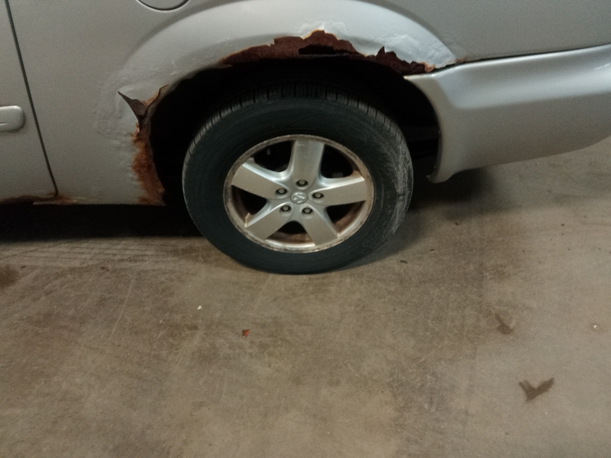 2005 dodge grand-caravan sxt with 208381 miles for sale near elk-river, minnesota 106468_13_rear_drv_wheel.jpg