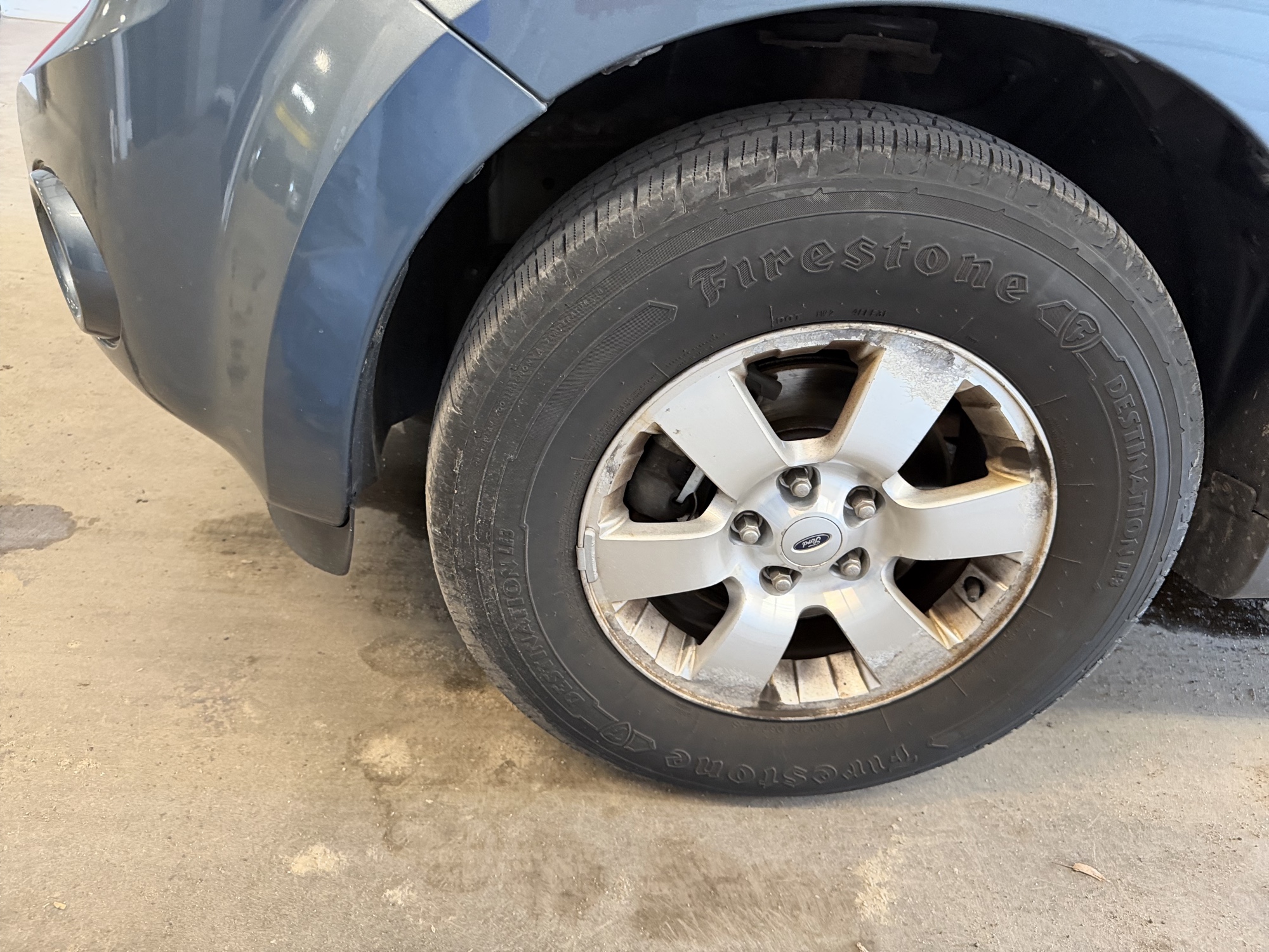 2011 ford escape limited-4wd with 142385 miles for sale near elk-river, minnesota 106472_12_drv_front_wheel.jpg