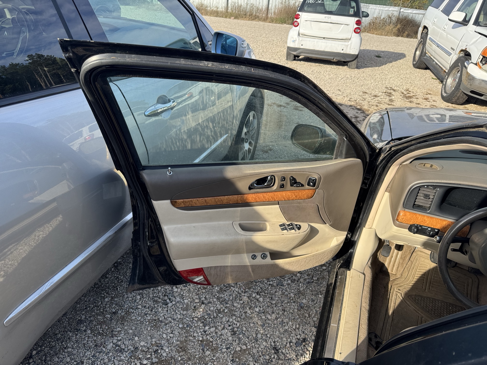 2002 lincoln continental base for sale near Elk River, Minnesota 106475_23_driver_door_panel.jpg
