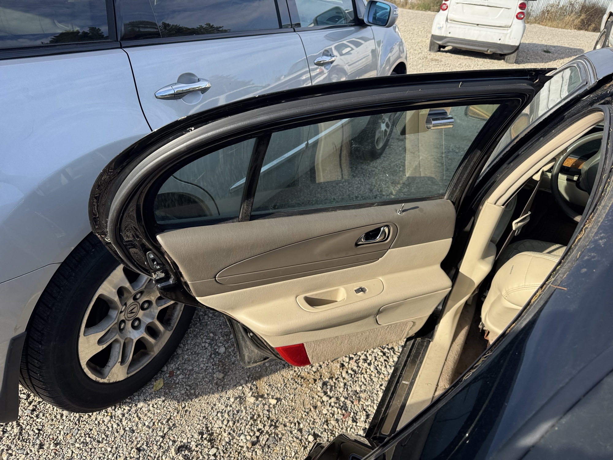 2002 lincoln continental base for sale near Elk River, Minnesota 106475_25_drv_rear_door_panel.jpg