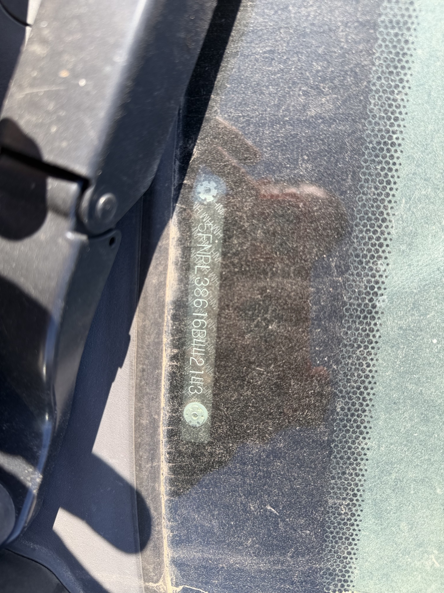 2006 honda odyssey ex-l with 261539 miles for sale near elk-river, minnesota 106484_48_windshield_vin_plate.jpg