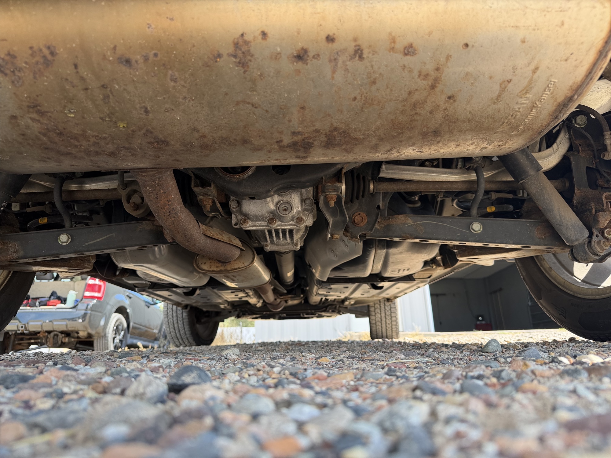2013 nissan rogue s-awd with 108328 miles for sale near elk-river, minnesota 106488_19_undercar_rear.jpg
