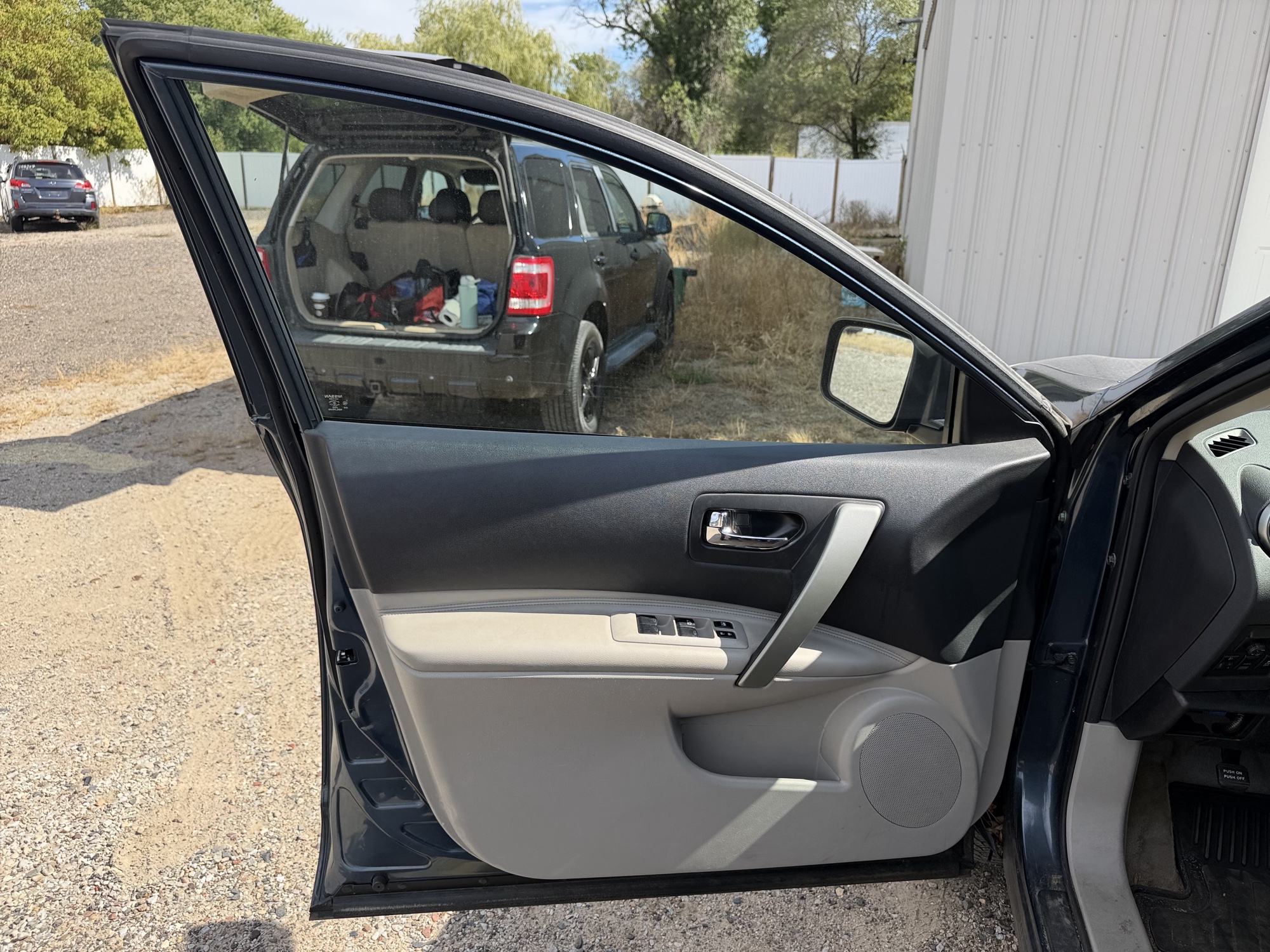 2013 nissan rogue s-awd with 108328 miles for sale near elk-river, minnesota 106488_23_driver_door_panel.jpg
